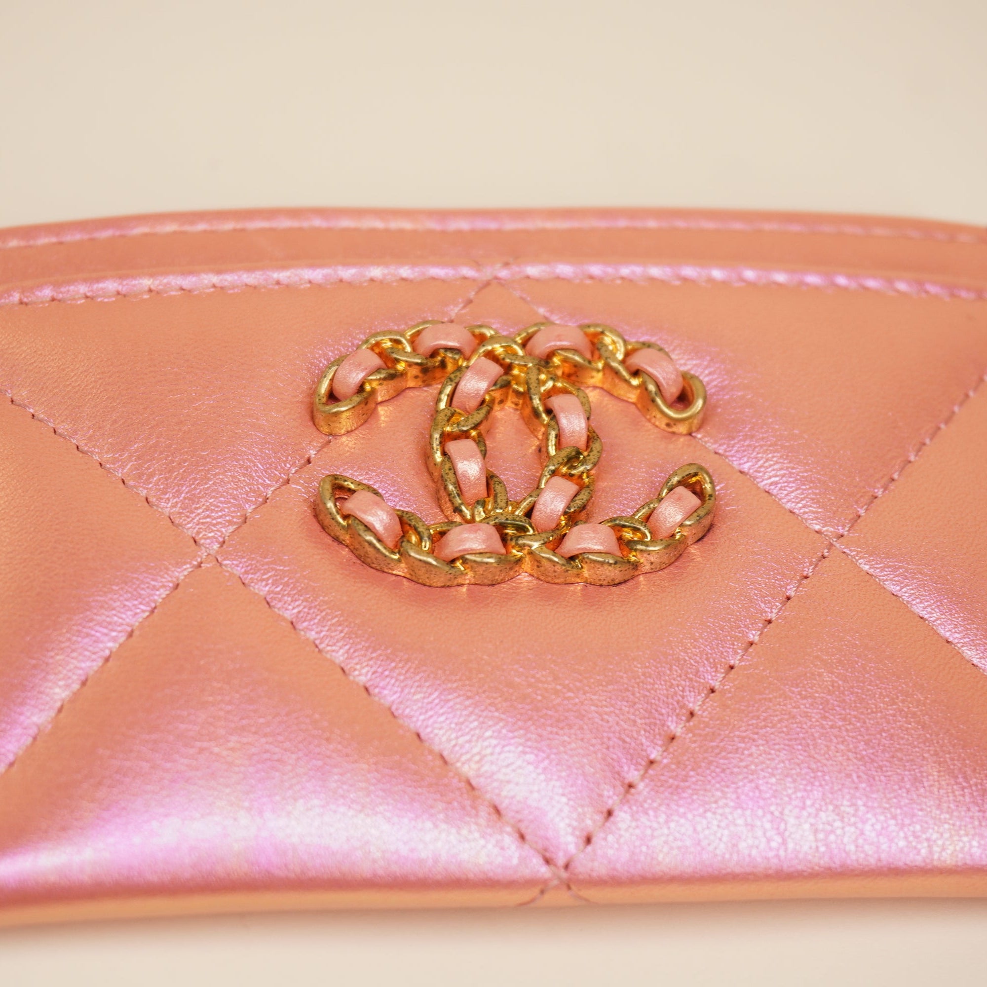 PRE-OWNED CC Pink Iridescent Calfskin Quilted Chanel 19 Card Holder