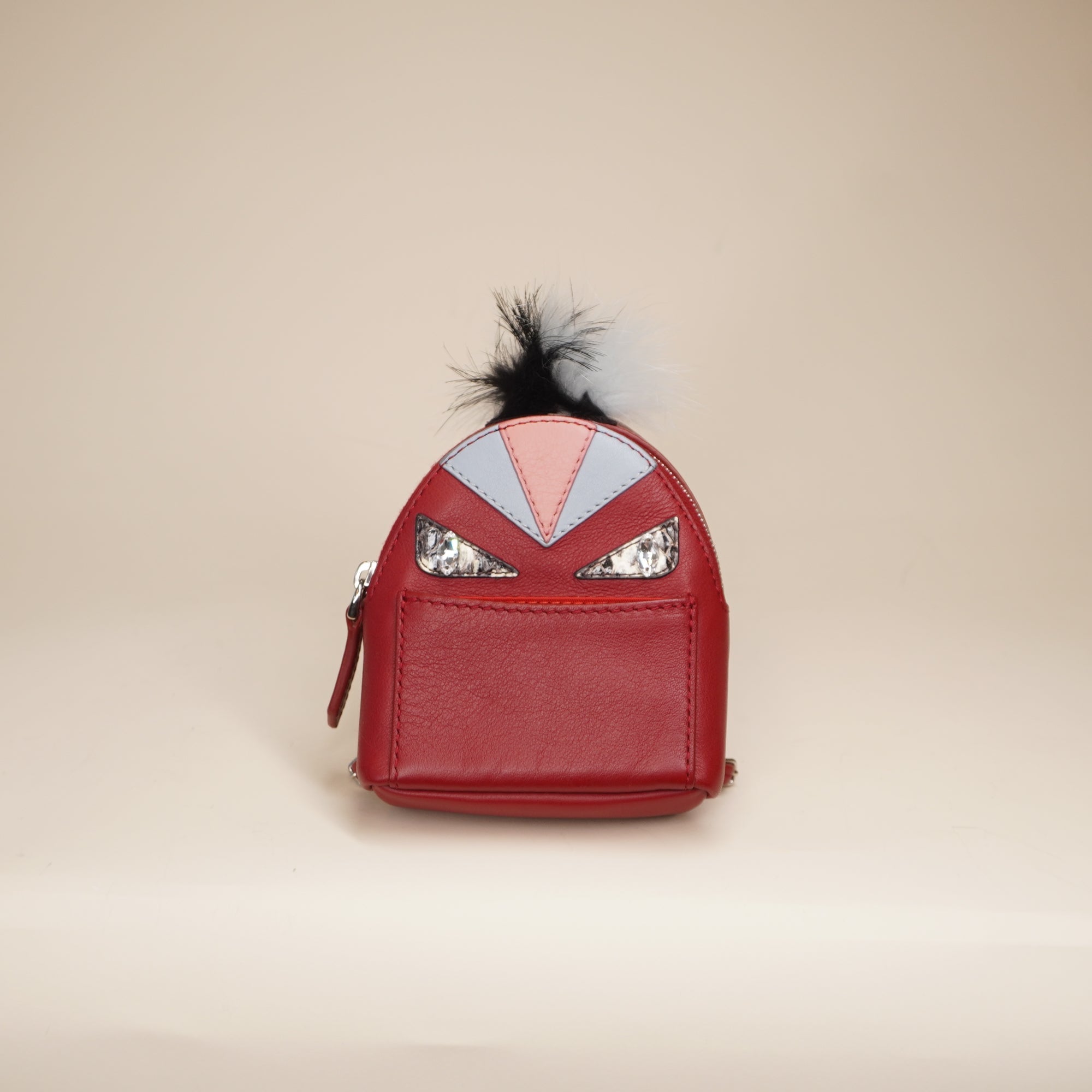 PRE-OWNED Red Leather Monster Eyes Fur Backpack Key Chain and Bag Charm