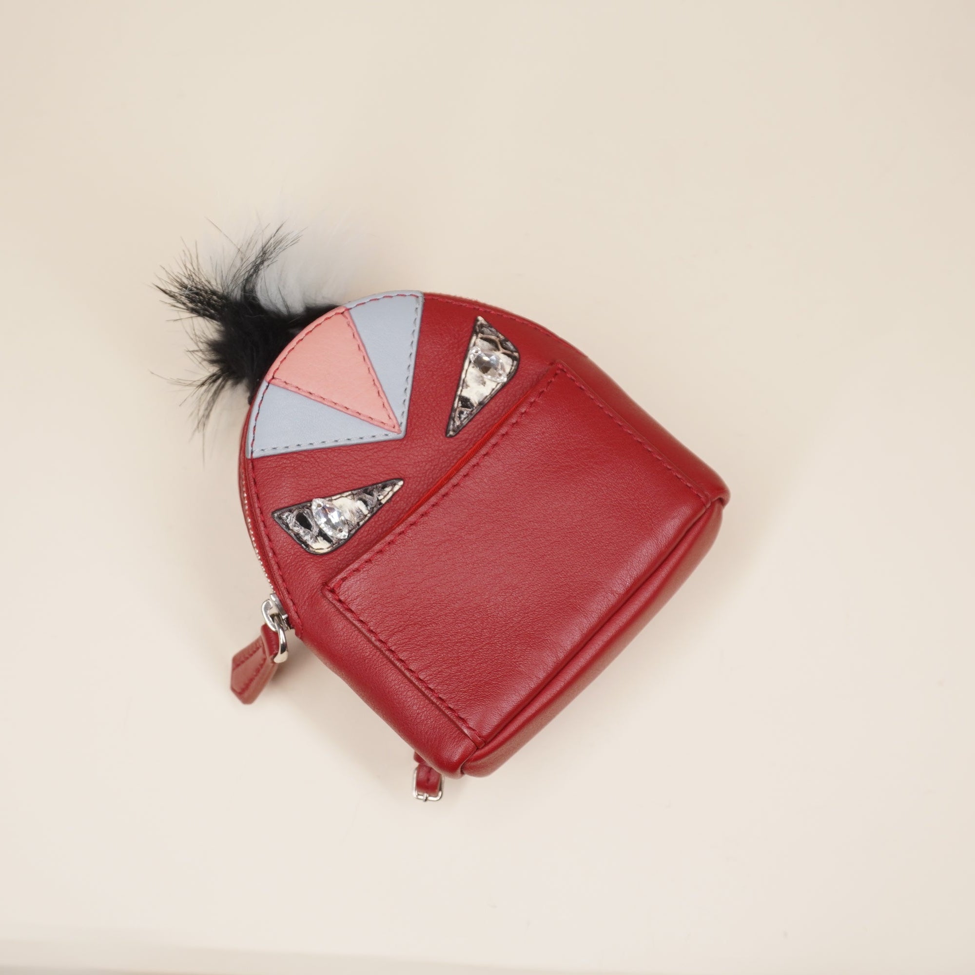 PRE-OWNED Red Leather Monster Eyes Fur Backpack Key Chain and Bag Charm