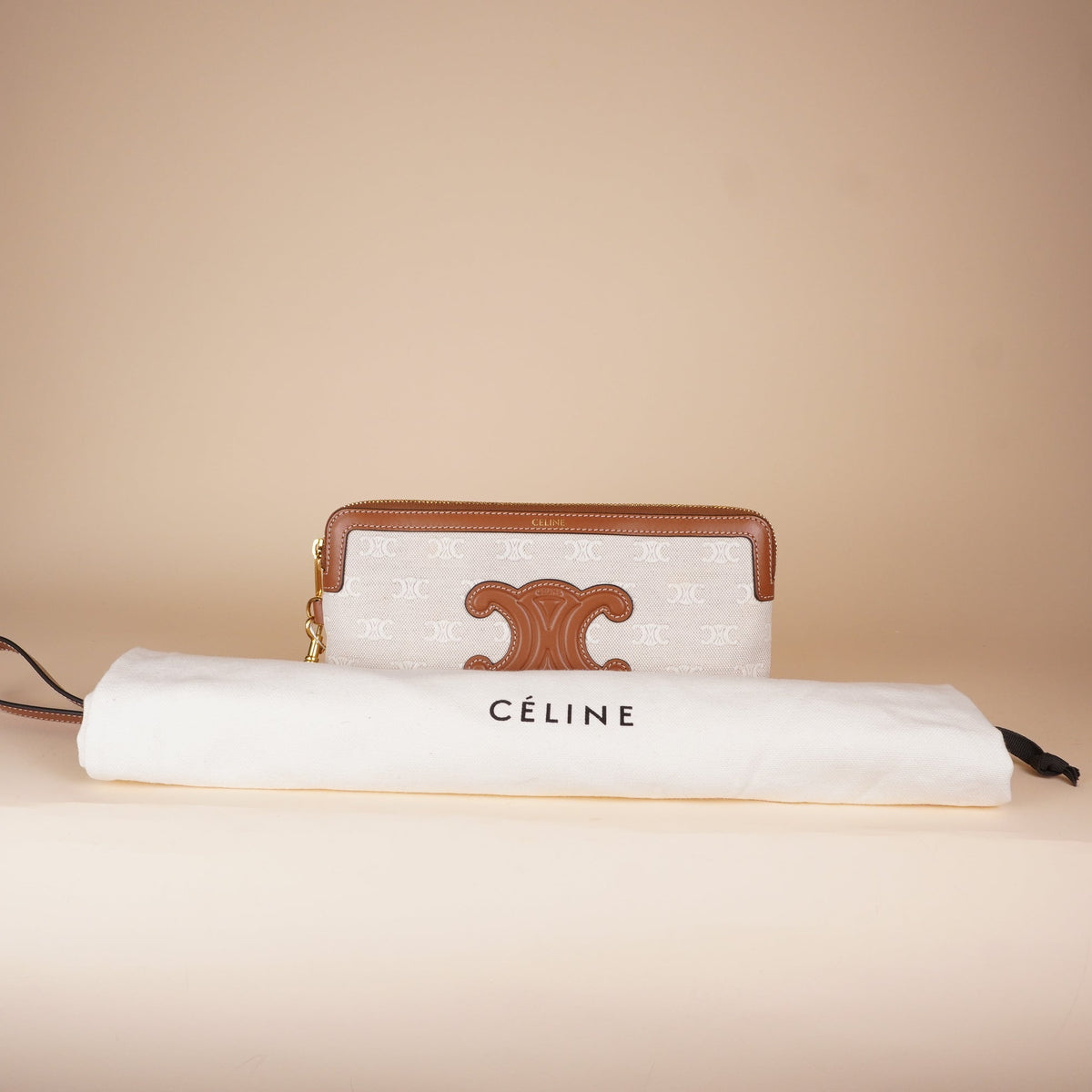 PRE-OWNED Triomphe Canvas Clutch Calfskin Trim