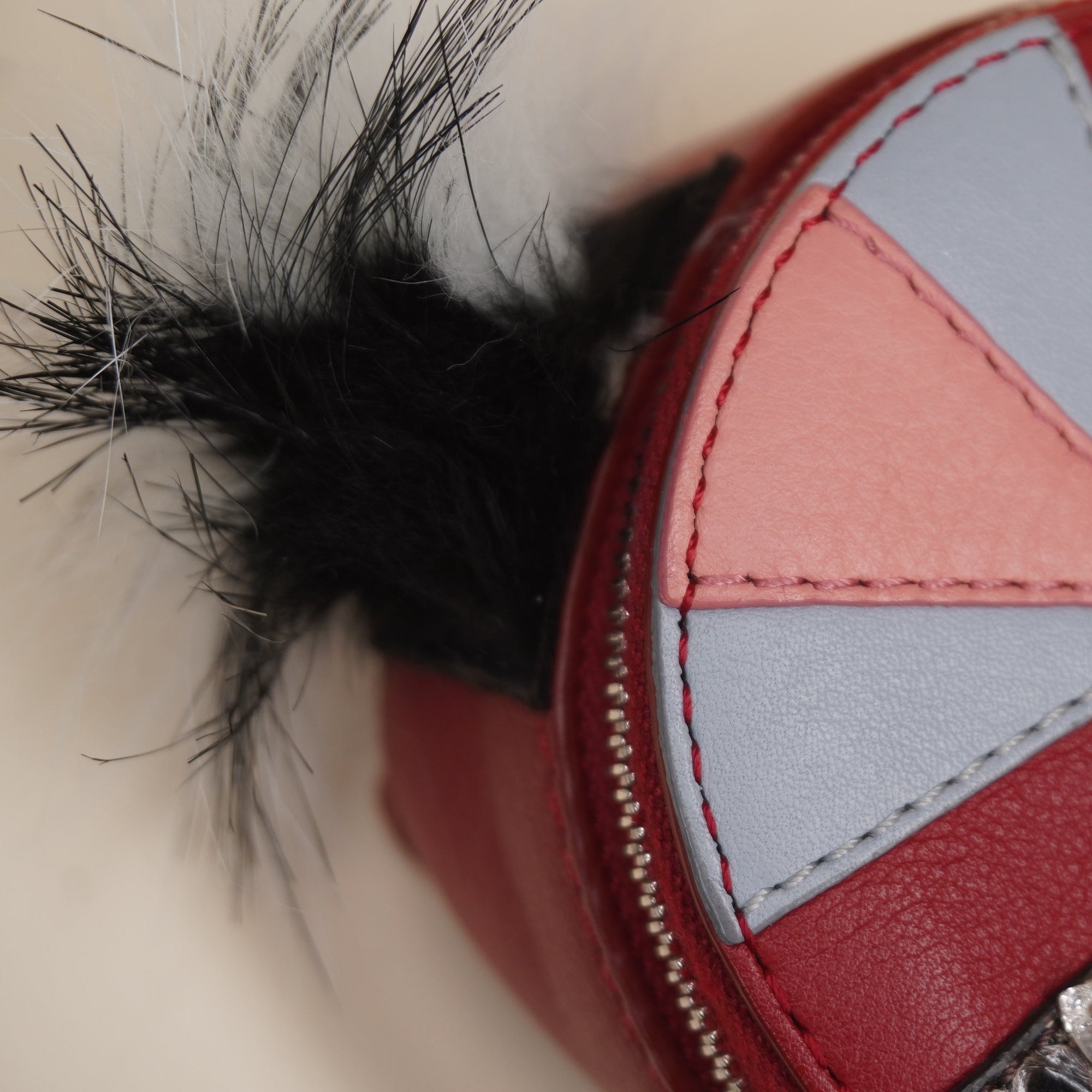 PRE-OWNED Red Leather Monster Eyes Fur Backpack Key Chain and Bag Charm