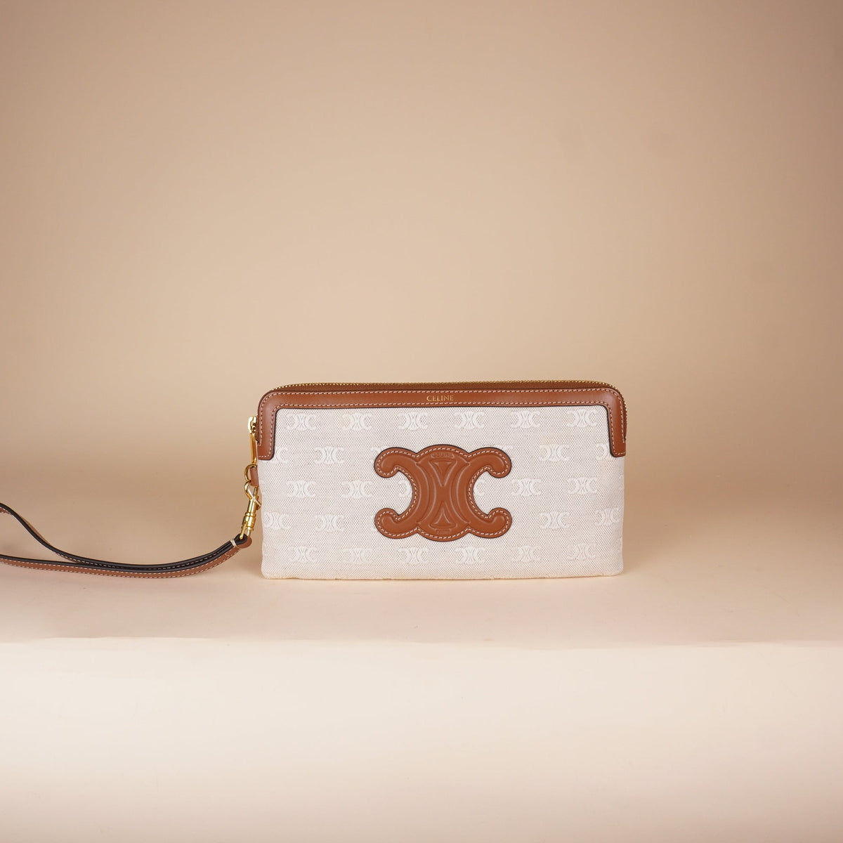 PRE-OWNED Triomphe Canvas Clutch Calfskin Trim