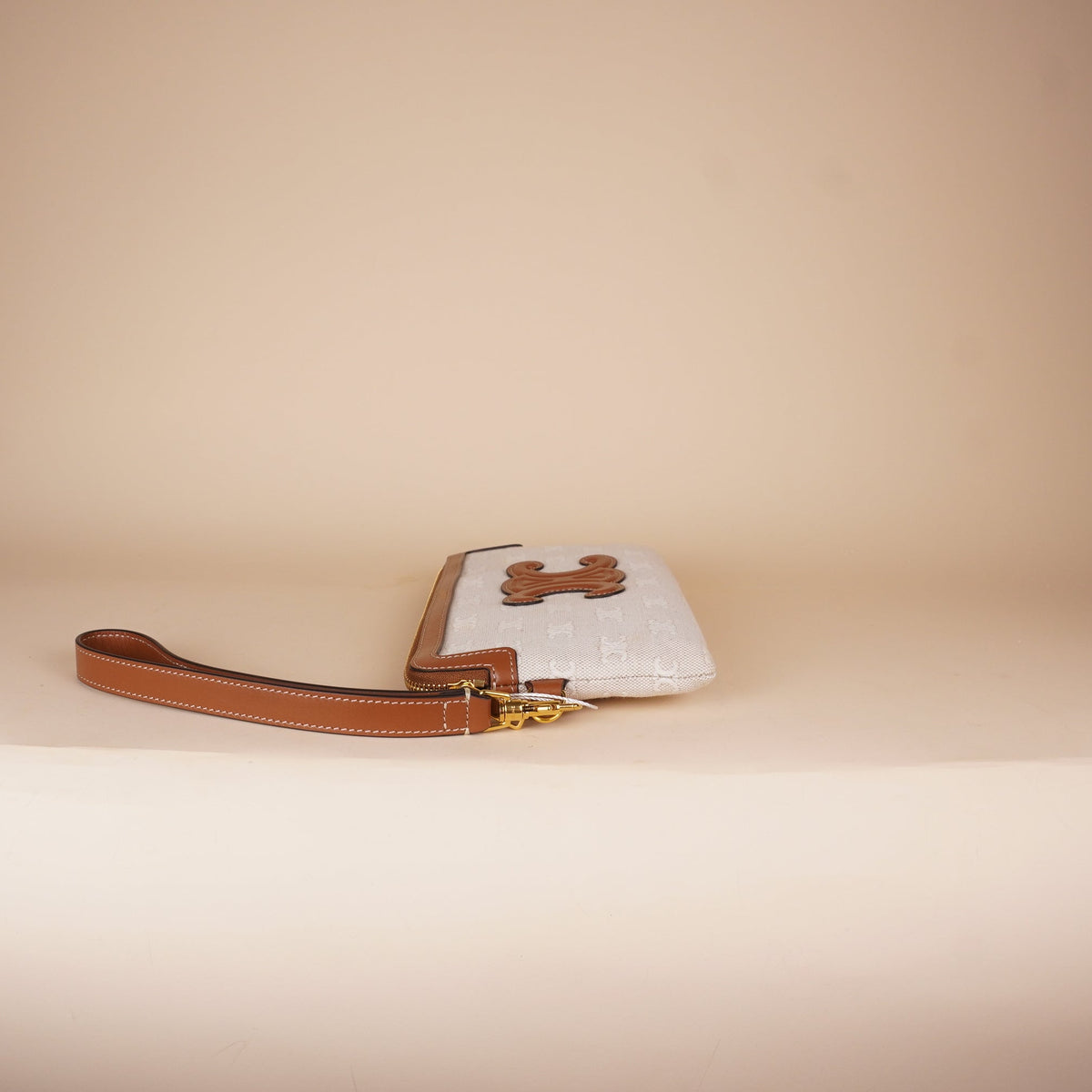 PRE-OWNED Triomphe Canvas Clutch Calfskin Trim