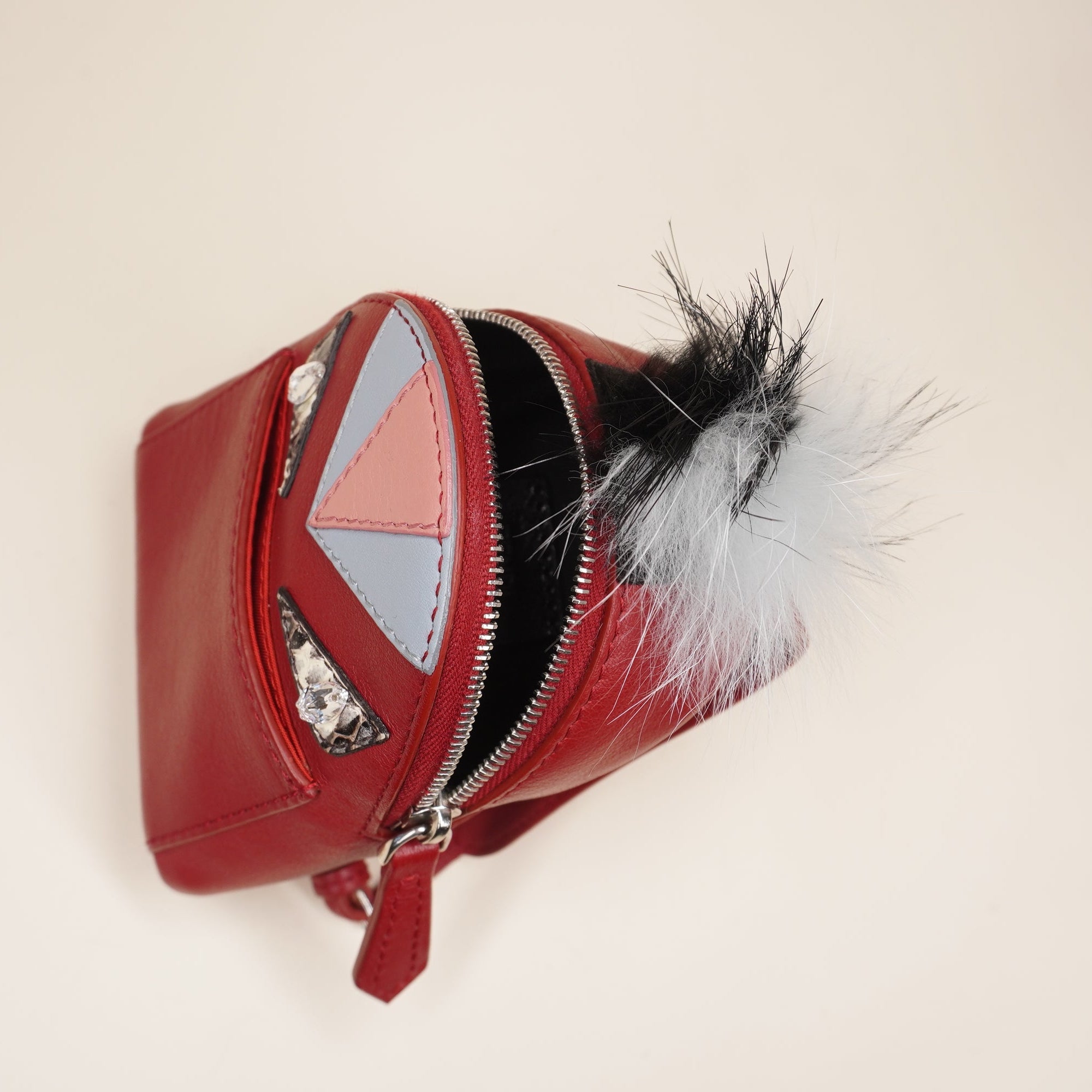 PRE-OWNED Red Leather Monster Eyes Fur Backpack Key Chain and Bag Charm