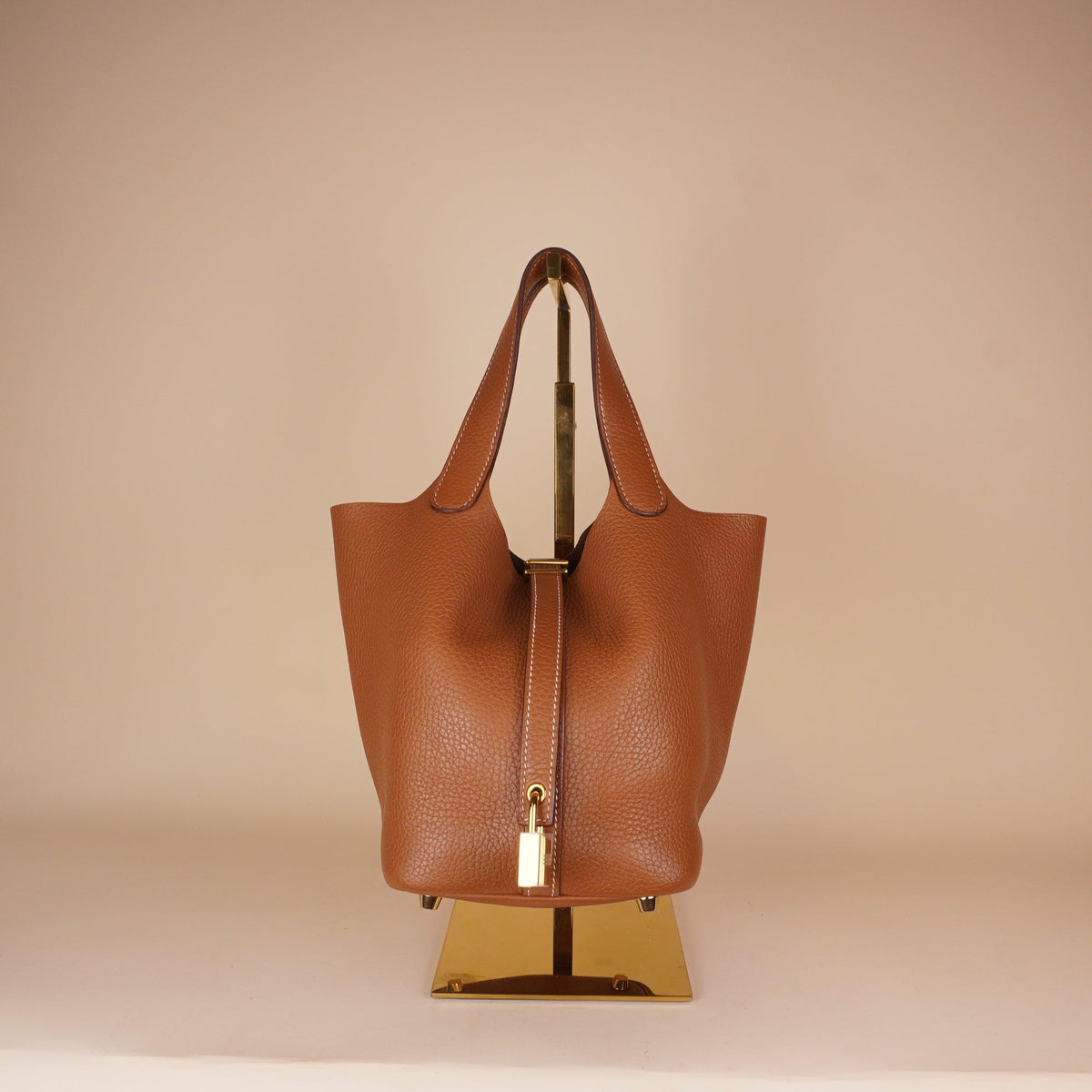 PRE-OWNED Taurillon Clemence Picotin Lock 18 PM Gold
