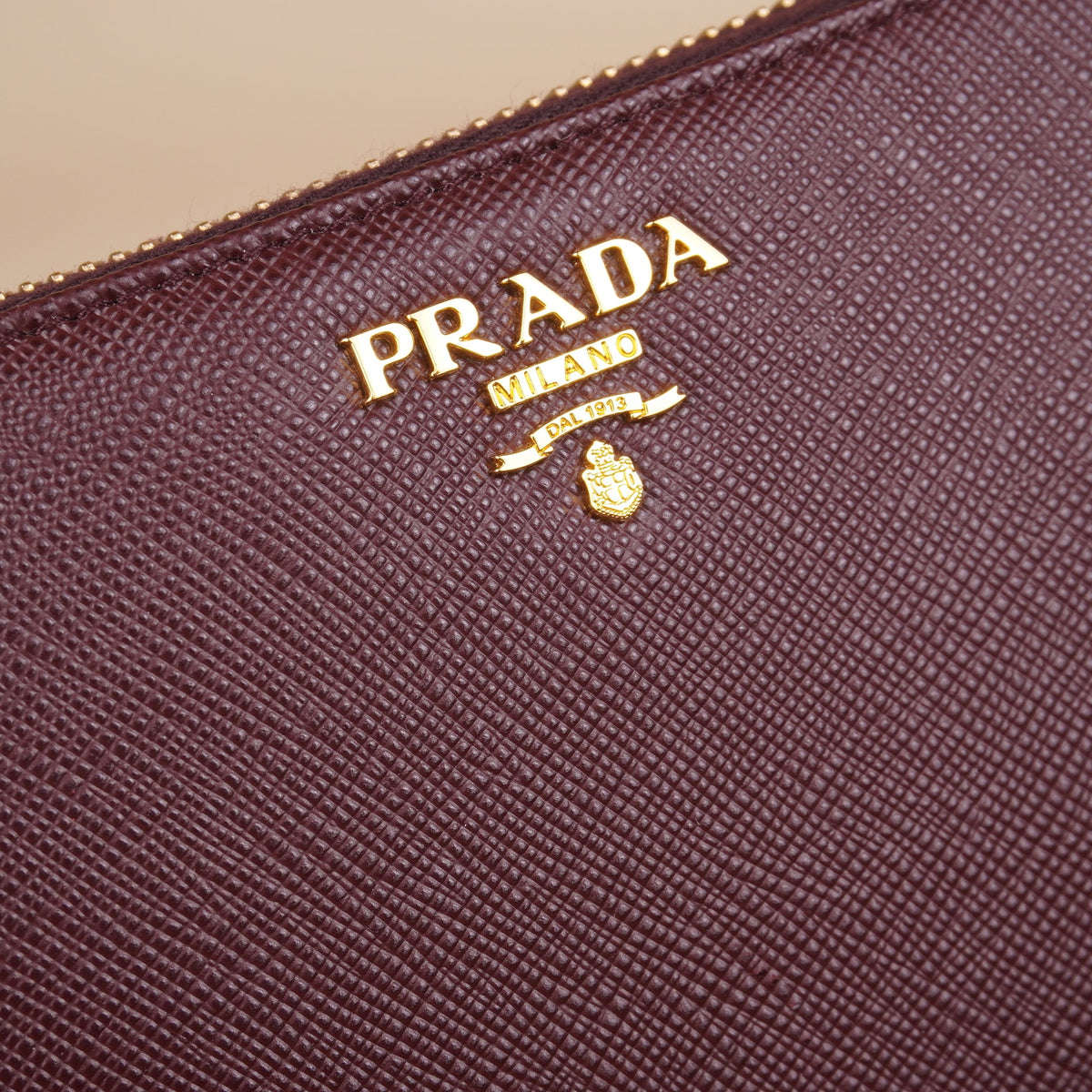 PRE-OWNED Saffiano Burgundy Zip-Around Wallet