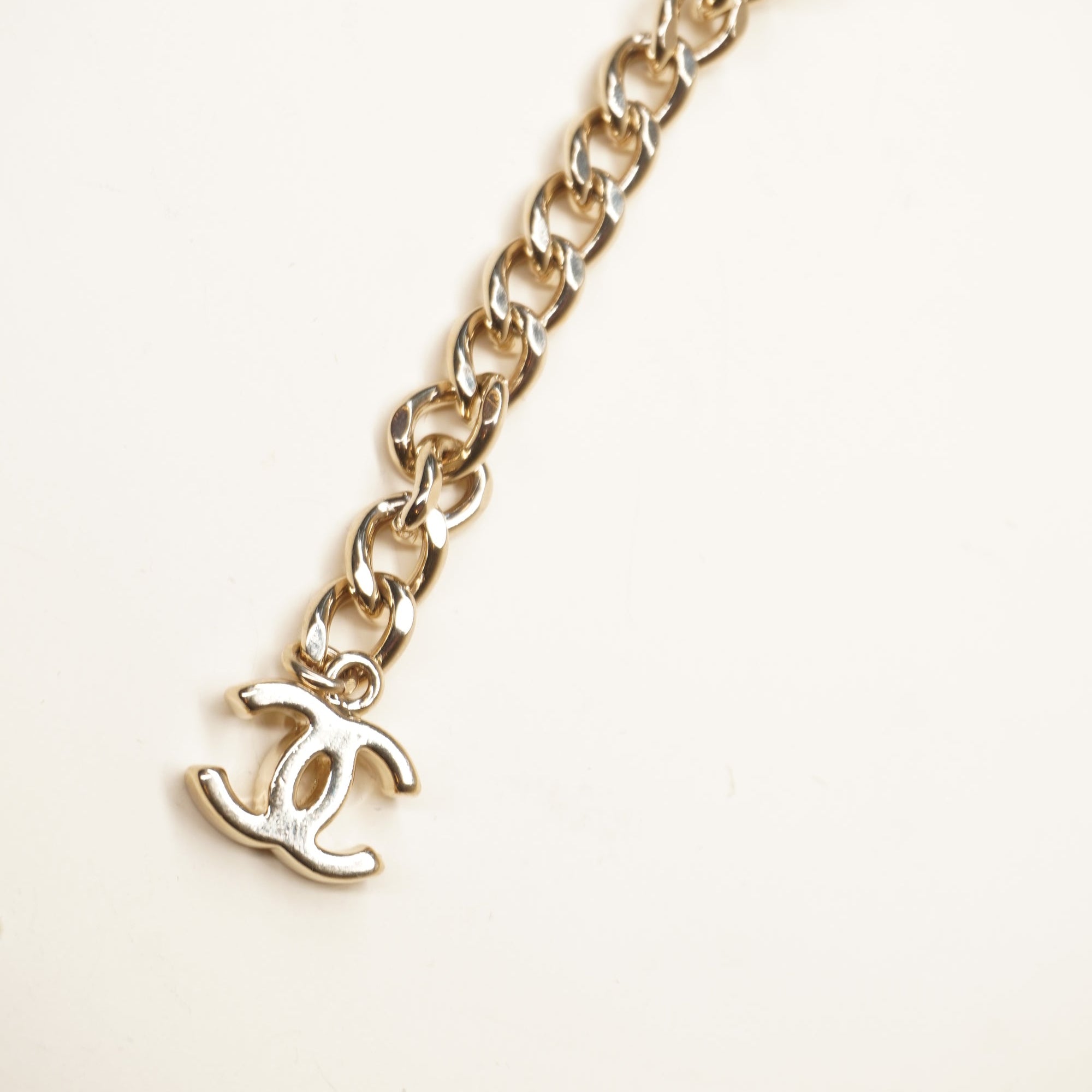 PRE-OWNED CC Letter Drop Chain Belt Light Gold Tone
