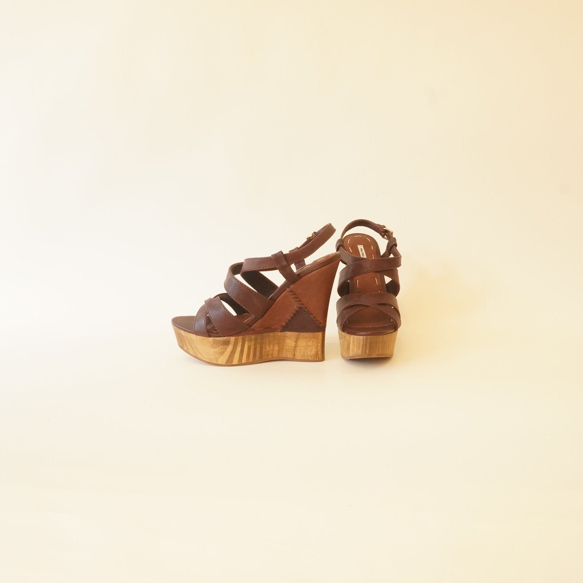 PRE-OWNED Brown Calfskin Patchwork Wedge Sandals (Size 37)