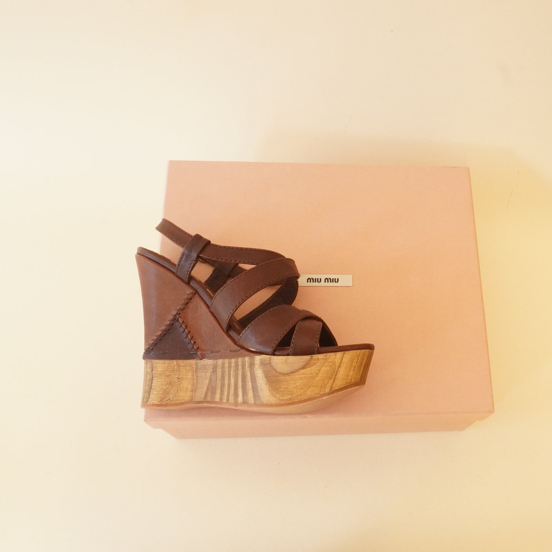 PRE-OWNED Brown Calfskin Patchwork Wedge Sandals (Size 37)