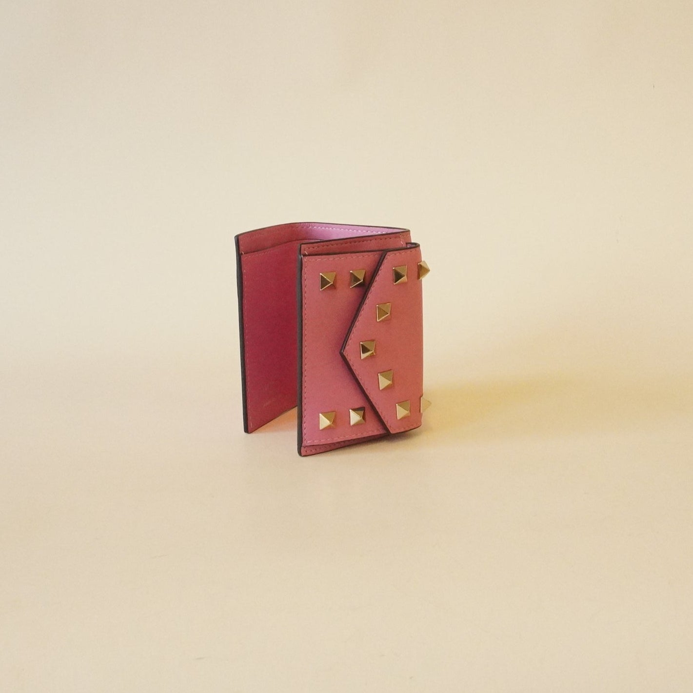 PRE-OWNED Rockstud Trifold Wallet Pink Leather Hardware