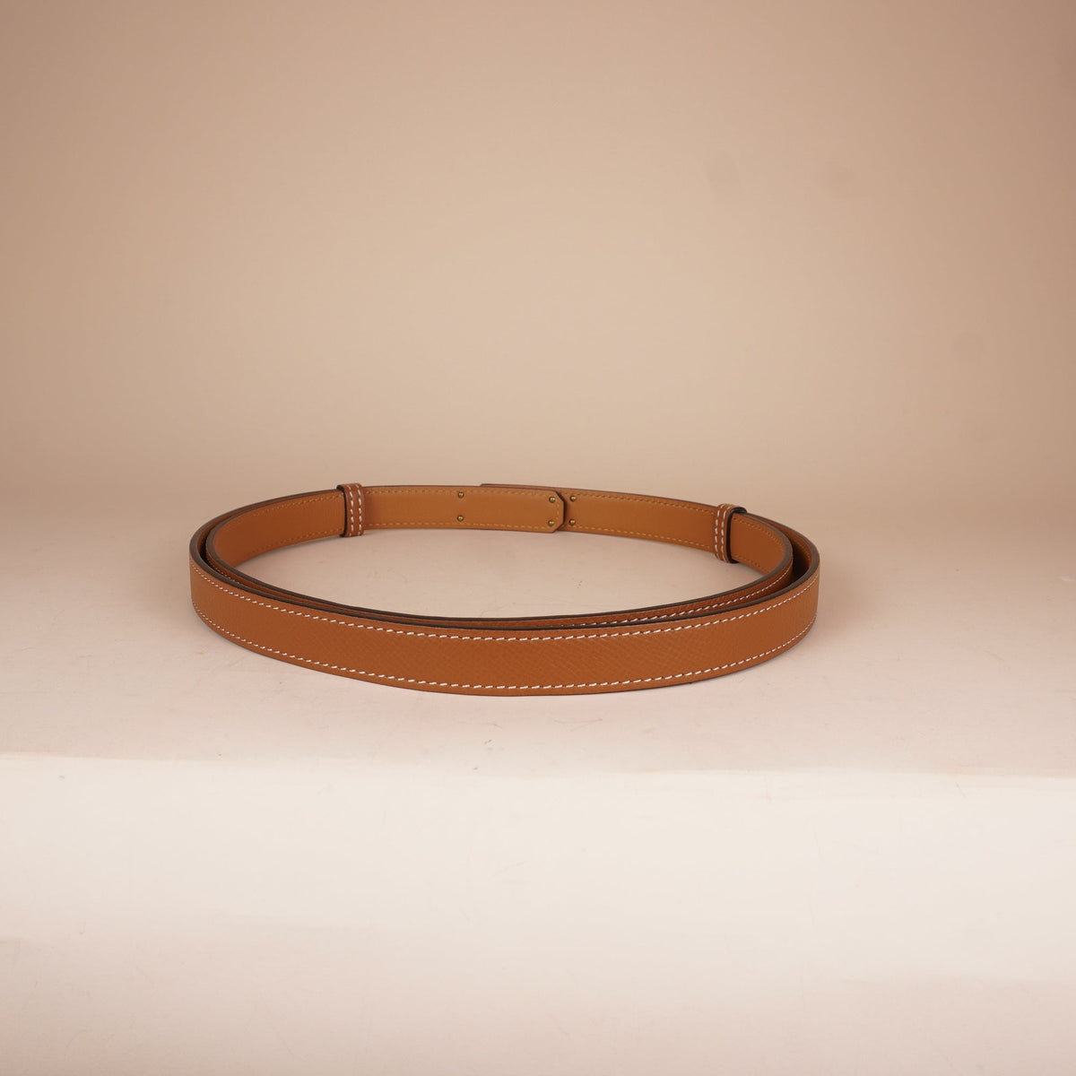 PRE-OWNED Brown Kelly 18 Belt in Gold Epsom