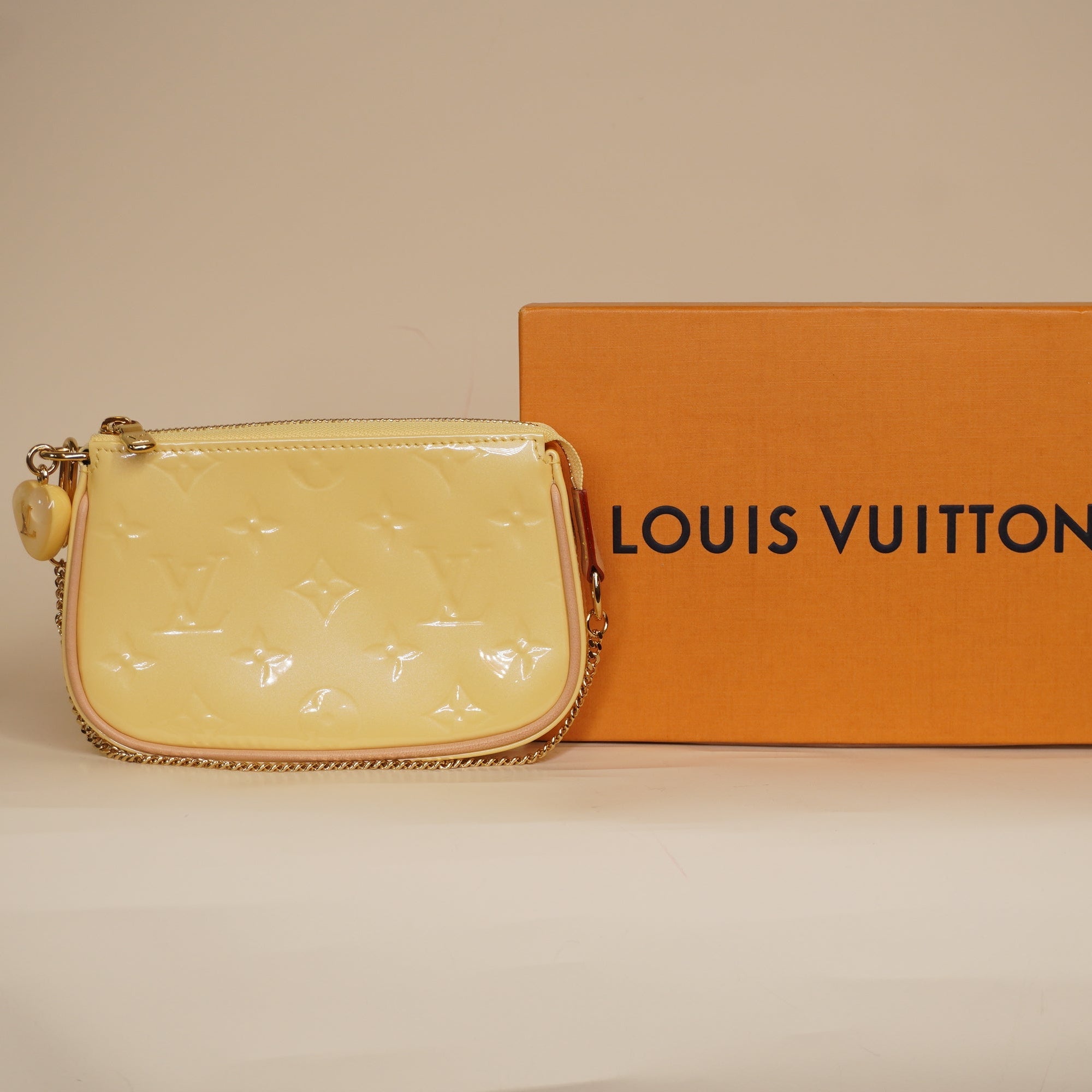 PRE-OWNED Valentine's Day Monogram Vernis Mini Pochette Shoulder Bag