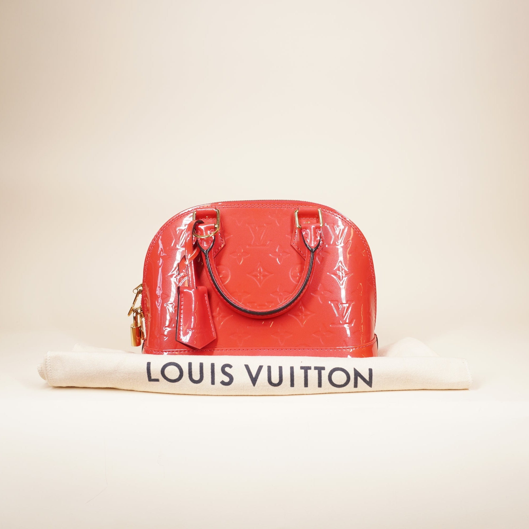 PRE-OWNED LV Alma BB Pink Vernis Shoulder Bag