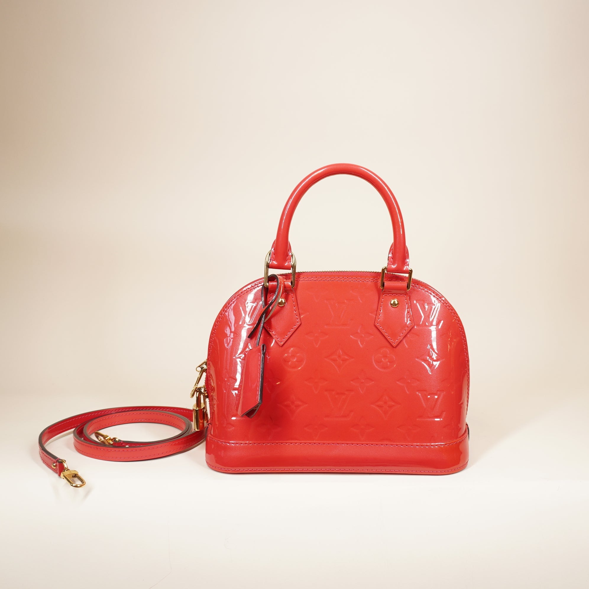 PRE-OWNED LV Alma BB Pink Vernis Shoulder Bag