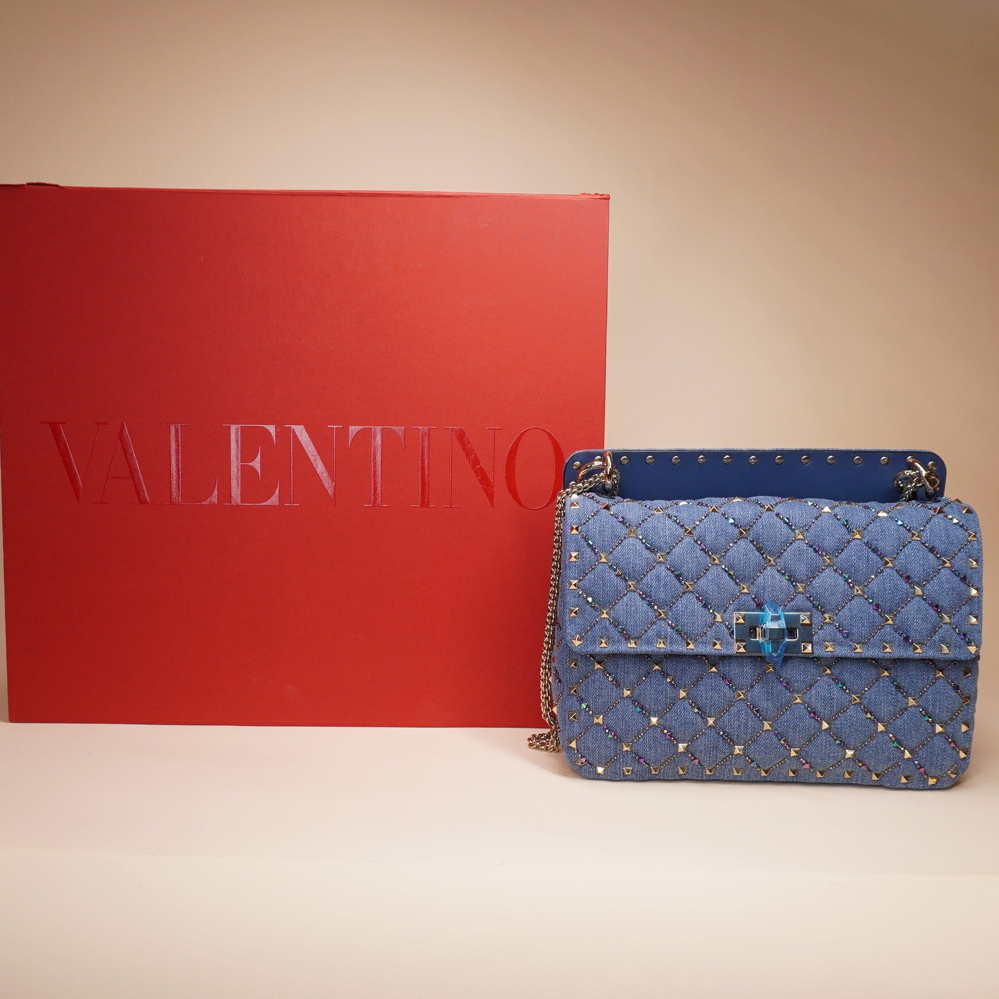 PRE-OWNED Rockstud Top Handle Denim Shoulder Bag