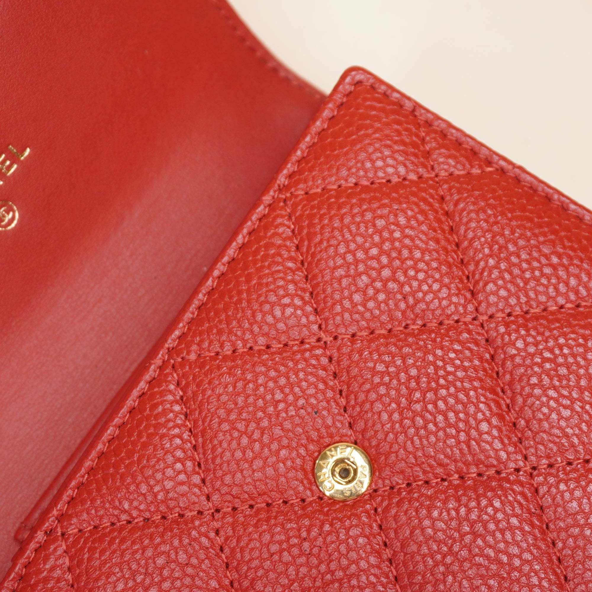 PRE-OWNED CC Tri-fold Red Figurine Compact Wallet Caviar Skin
