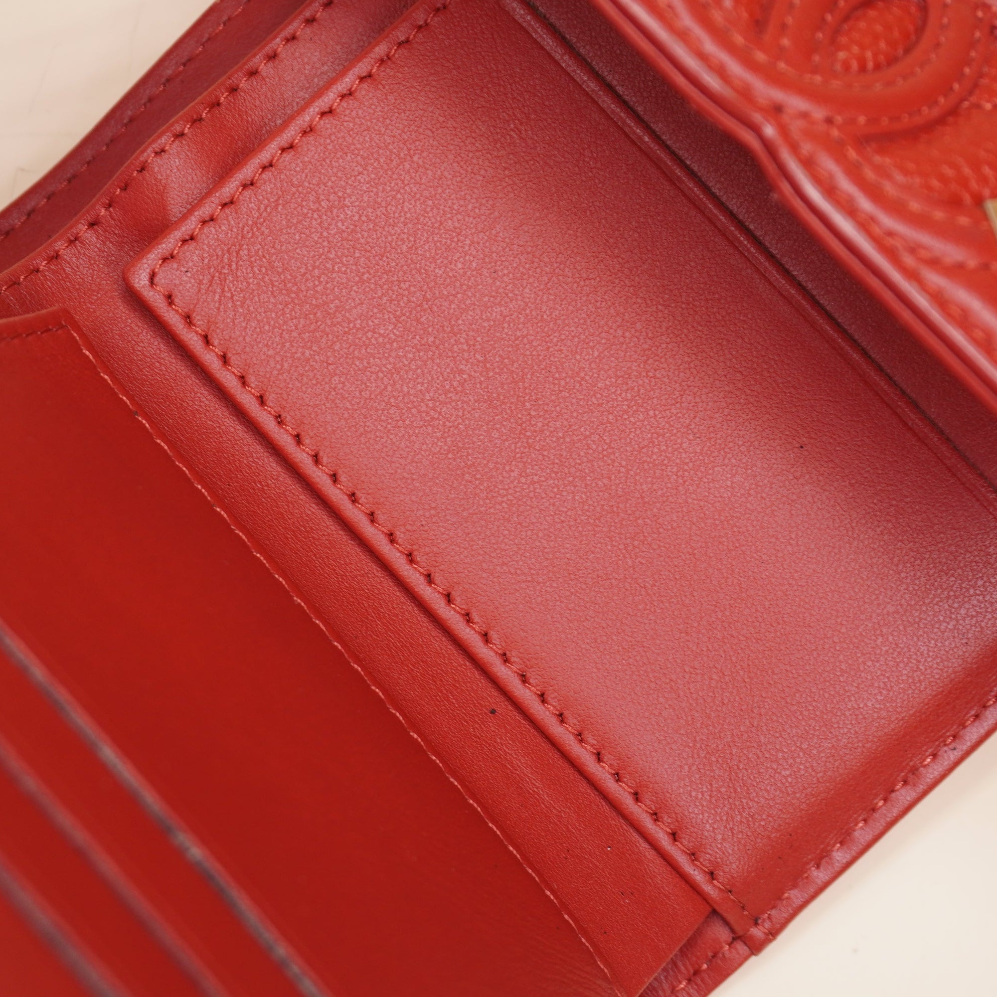 PRE-OWNED CC Tri-fold Red Figurine Compact Wallet Caviar Skin