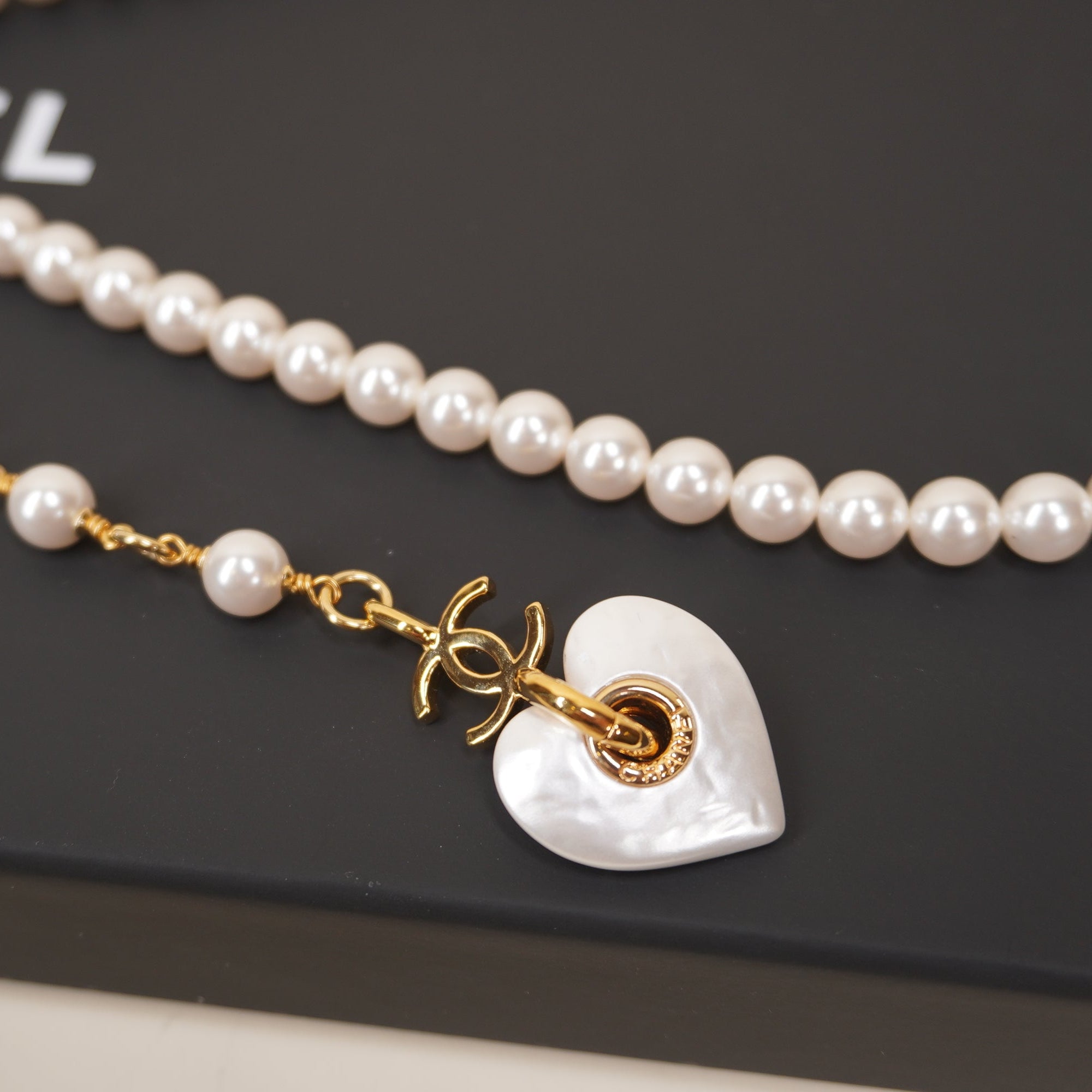 PRE-OWNED Faux Pearl Belt Double-Strand Heart and interlocking CC logo charm