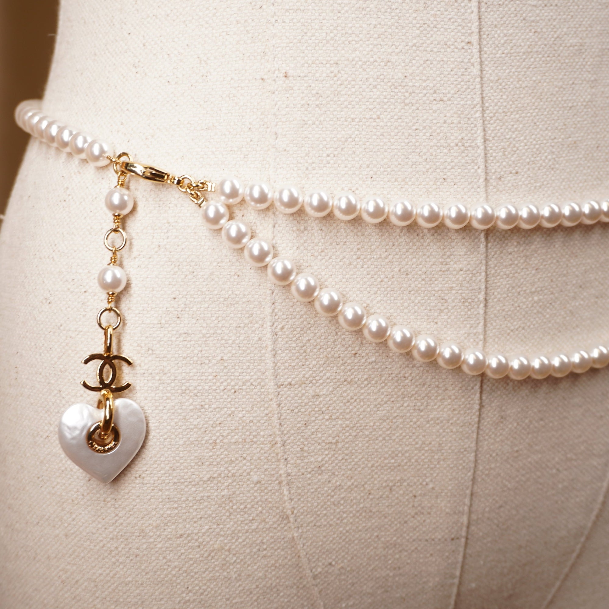 PRE-OWNED Faux Pearl Belt Double-Strand Heart and interlocking CC logo charm