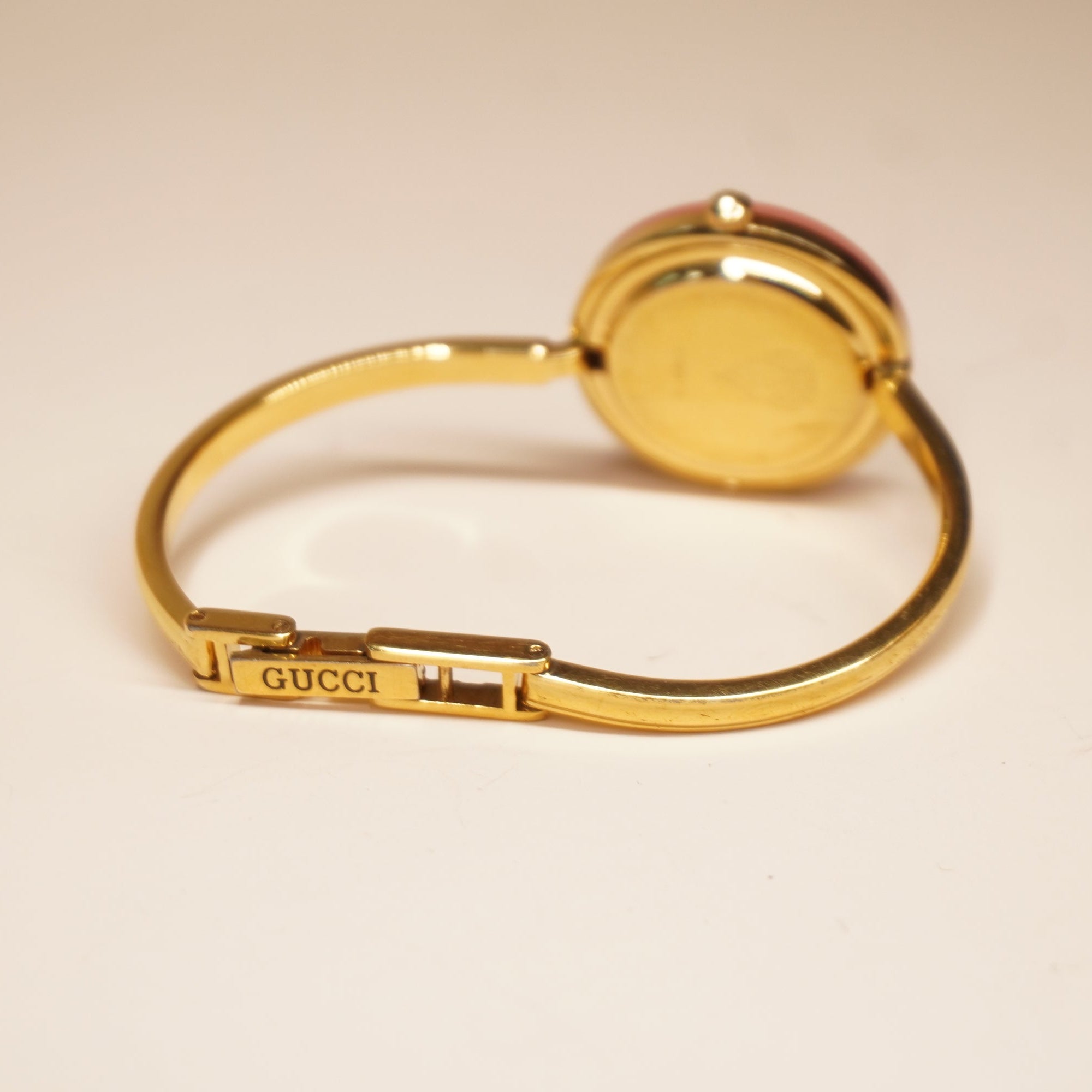 PRE-OWNED GG Vintage watch 11 interchangeable bezel, gold plated