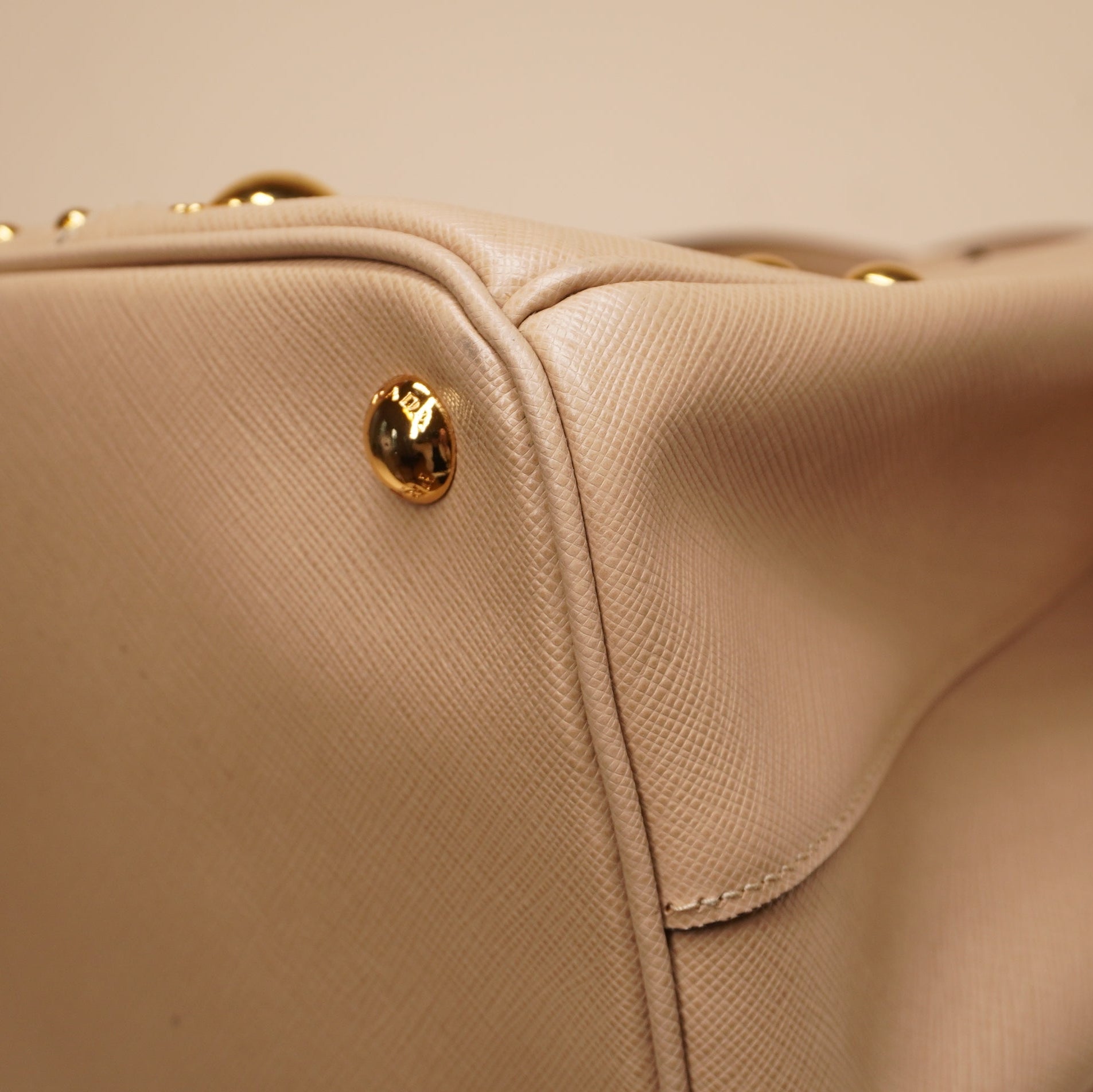 PRE-OWNED Beige Turn Lock Studded Shoulder Bag