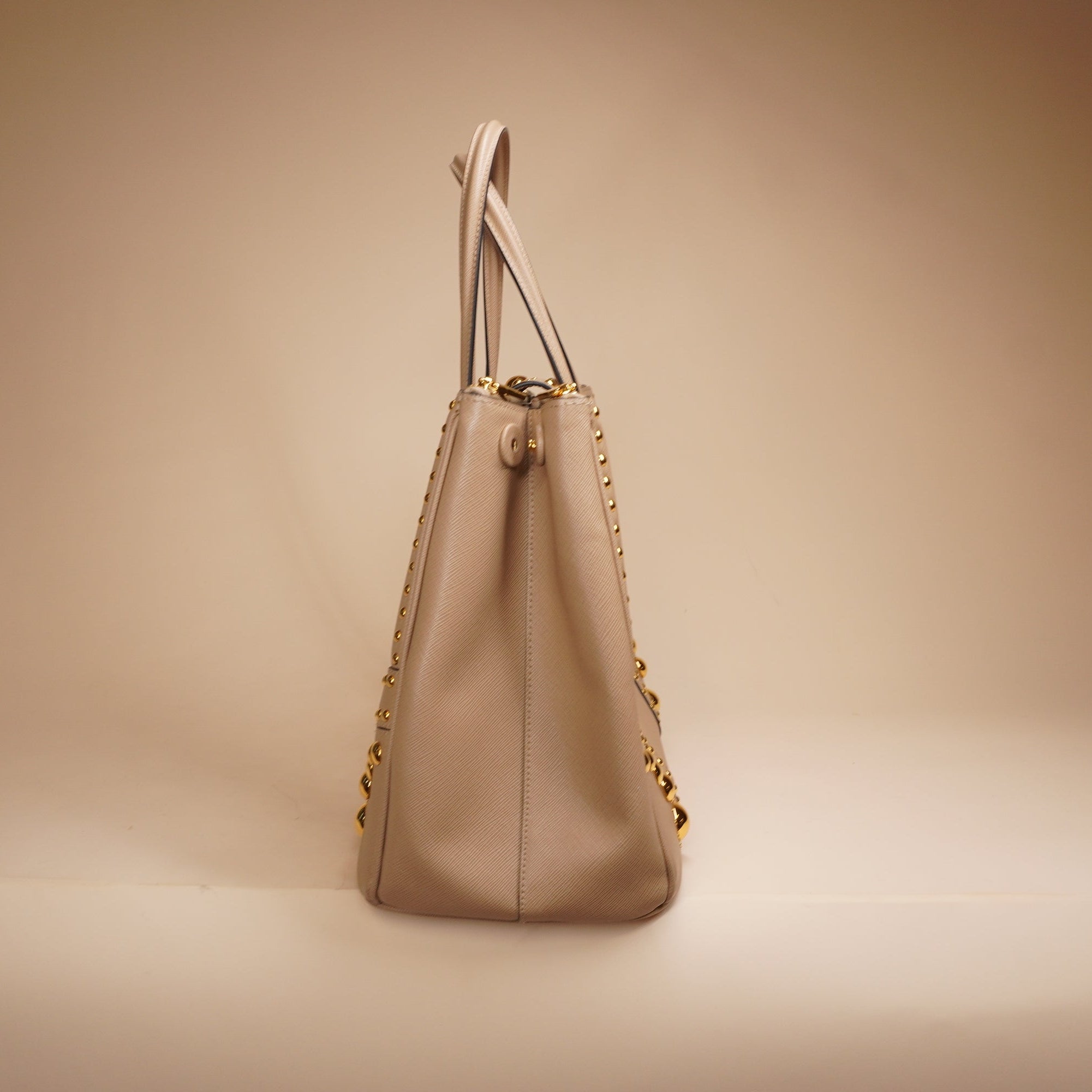 PRE-OWNED Beige Turn Lock Studded Shoulder Bag