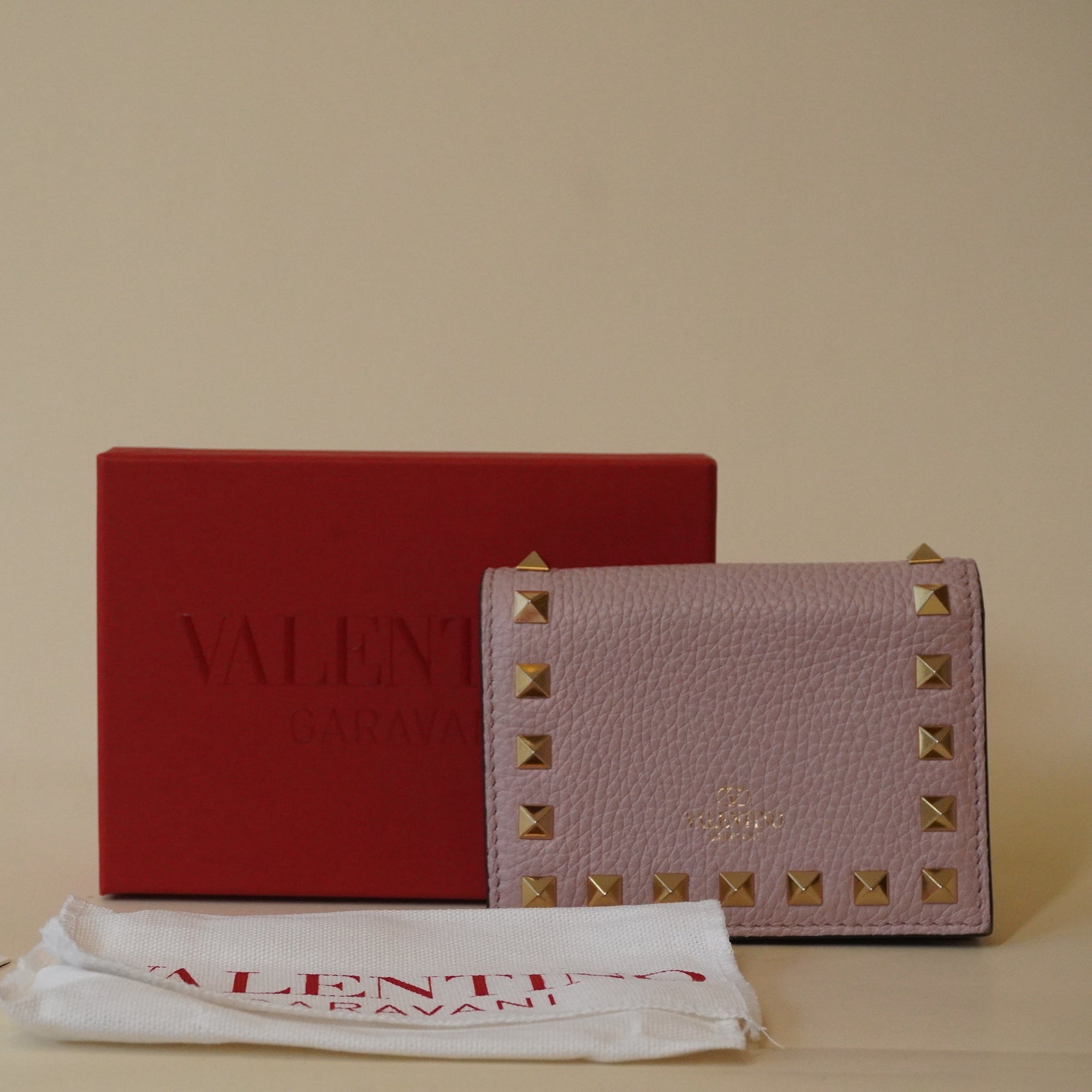 PRE-OWNED Rockstud Bifold Wallet Pink Leather