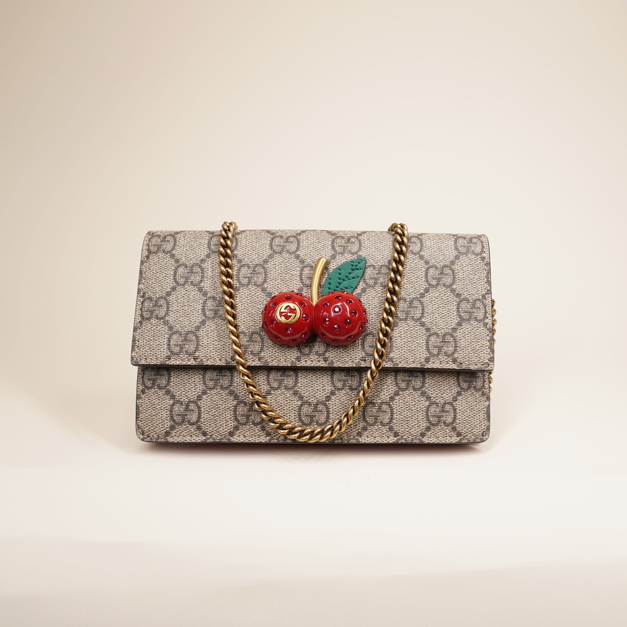 PRE-OWNED GG Supreme Monogram Mini Cherry WOC