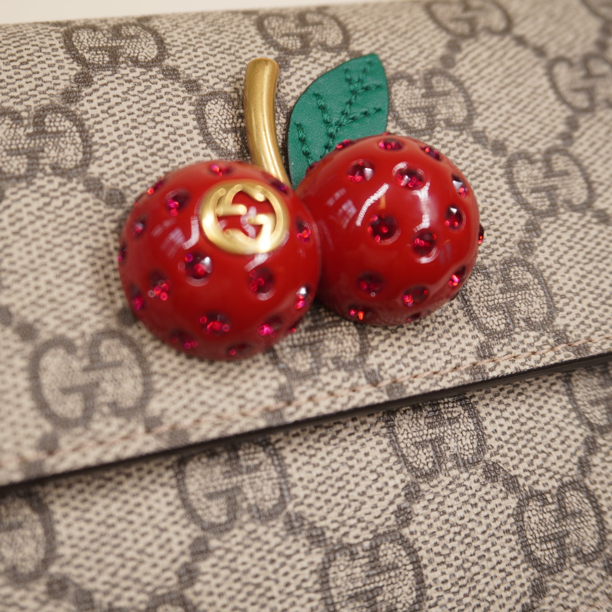 PRE-OWNED GG Supreme Monogram Mini Cherry WOC