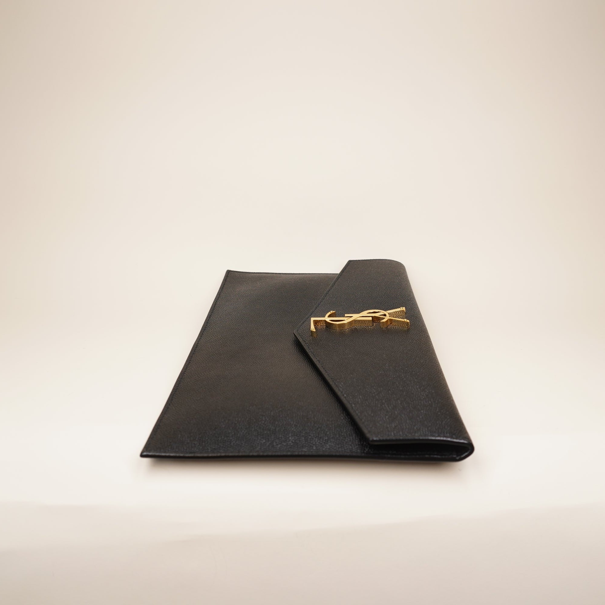 PRE-OWNED Black Uptown Calfskin Pouch