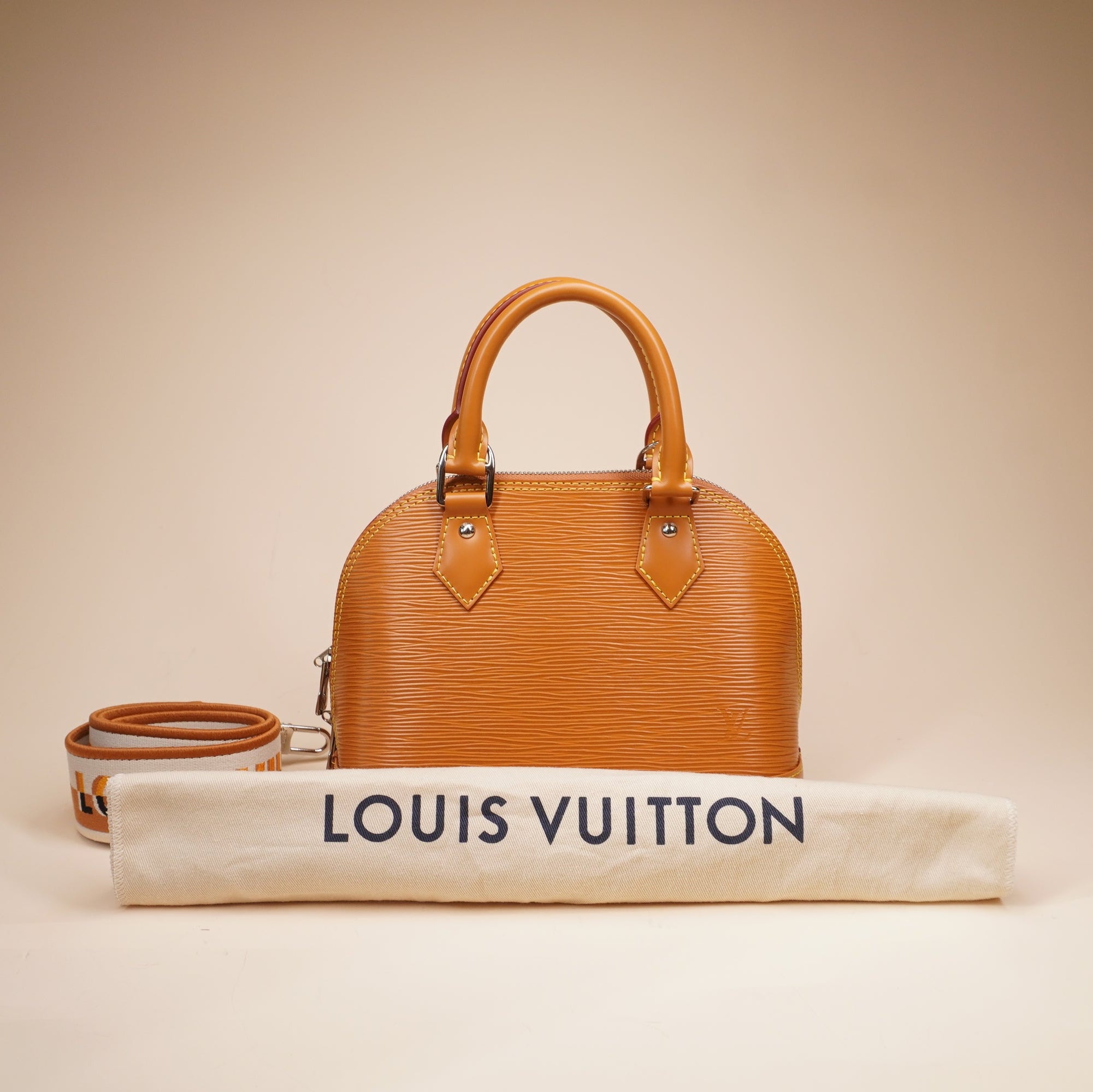 PRE-OWNED LV Camel Alma Epi Leather with Logo Jacquard Strap BB Crossbody Bag 
