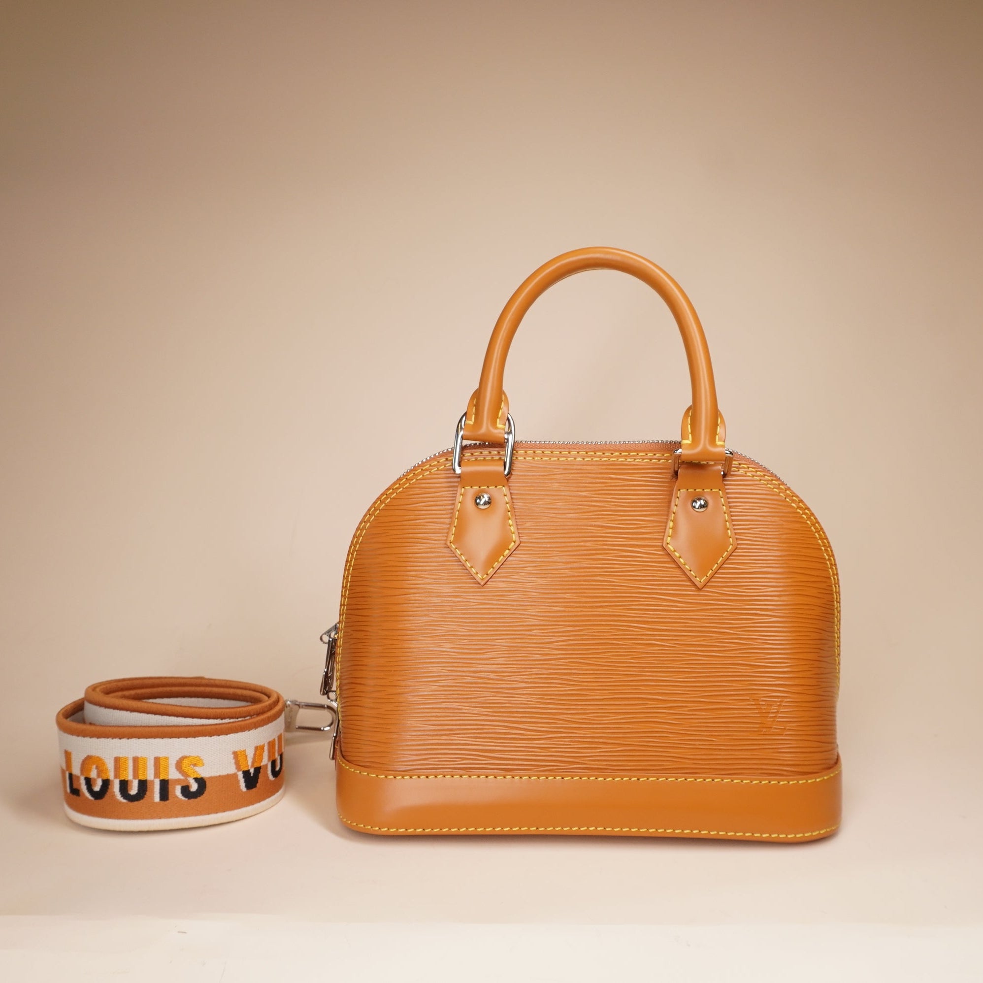 PRE-OWNED LV Camel Alma Epi Leather with Logo Jacquard Strap BB Crossbody Bag 