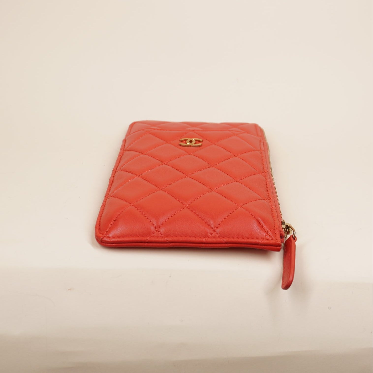 PRE-OWNED Caviar Quilted Classic iPhone Pouch Red