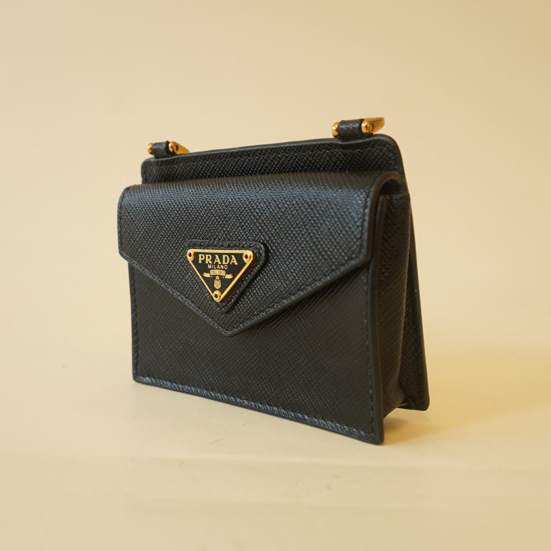 PRE-OWNED Saffiano Triangle Card Holder On Strap Black