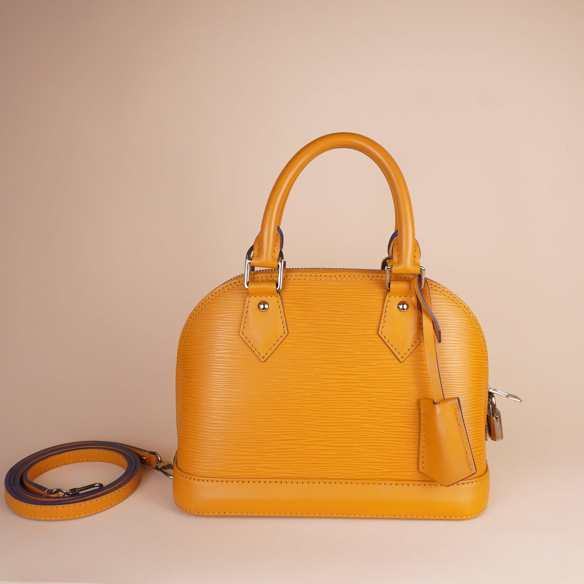 PRE-OWNED LV Gold Miel Epi Leather Alma BB Bag