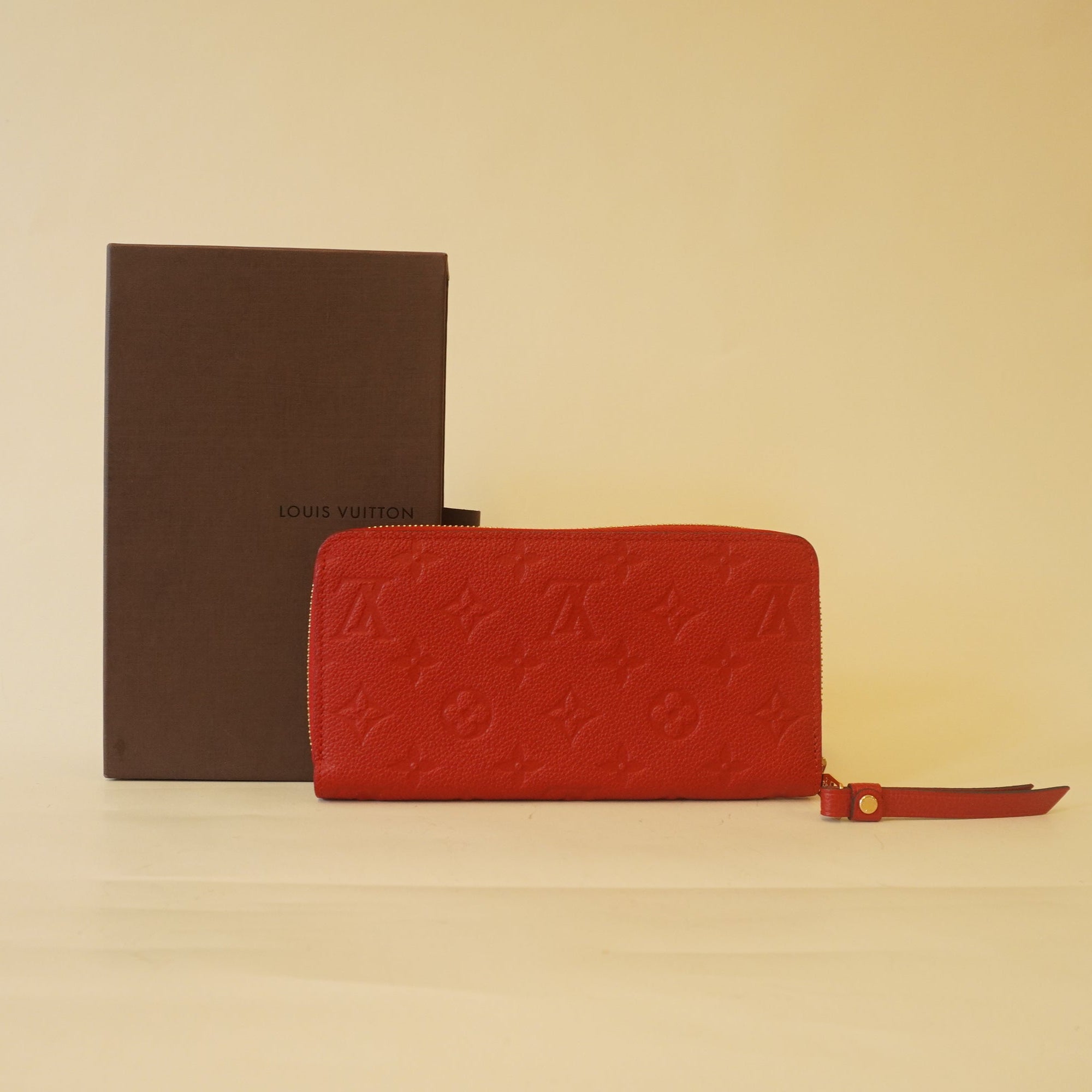 PRE-OWNED -  Red Monogram Empreinte Leather Zippy Wallet 