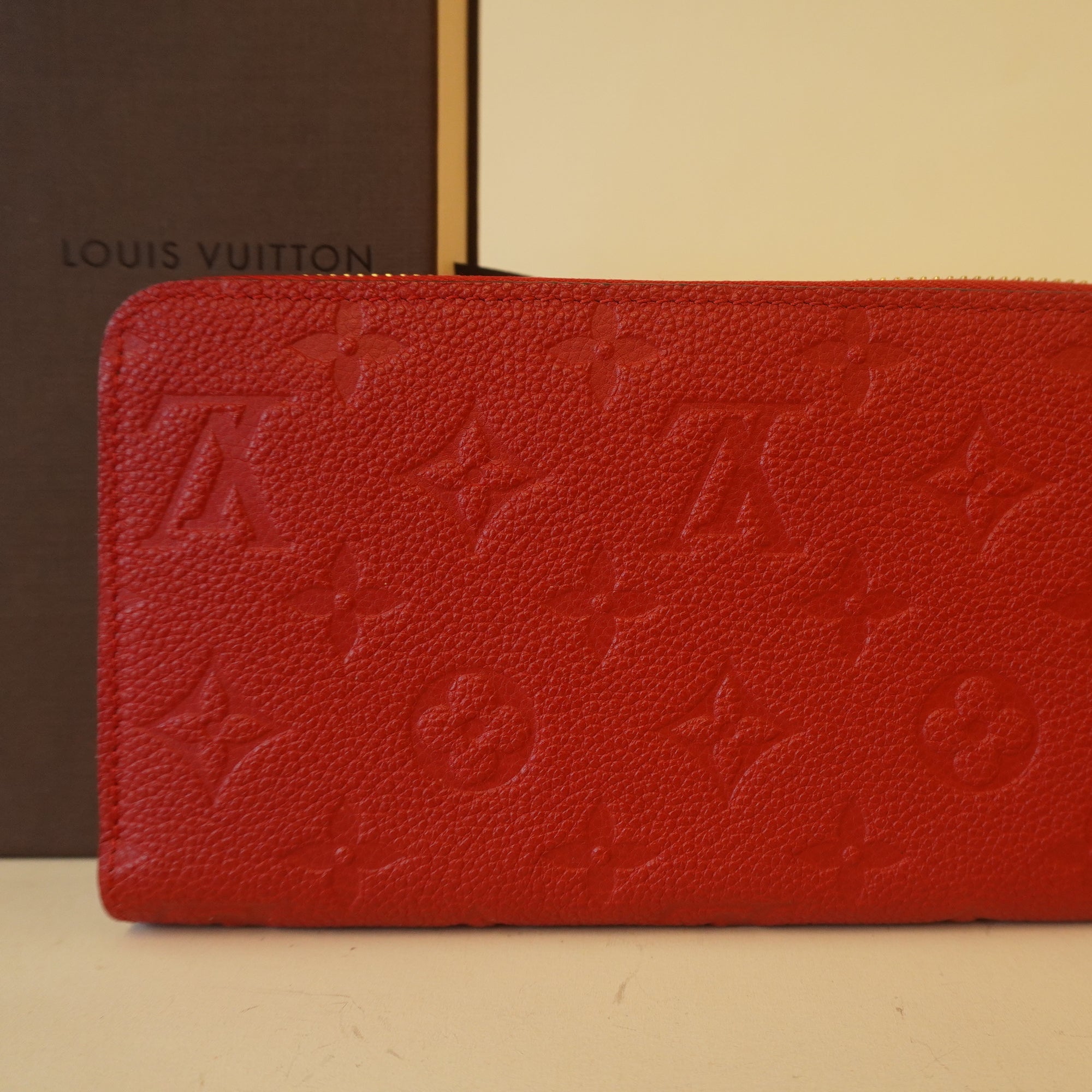 PRE-OWNED -  Red Monogram Empreinte Leather Zippy Wallet 