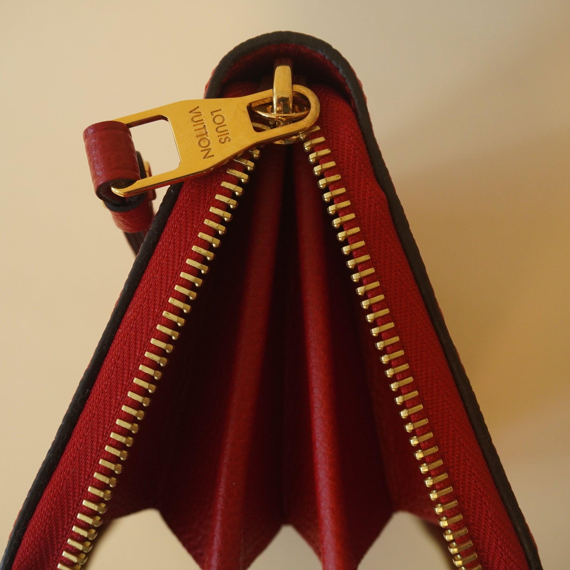 PRE-OWNED -  Red Monogram Empreinte Leather Zippy Wallet 