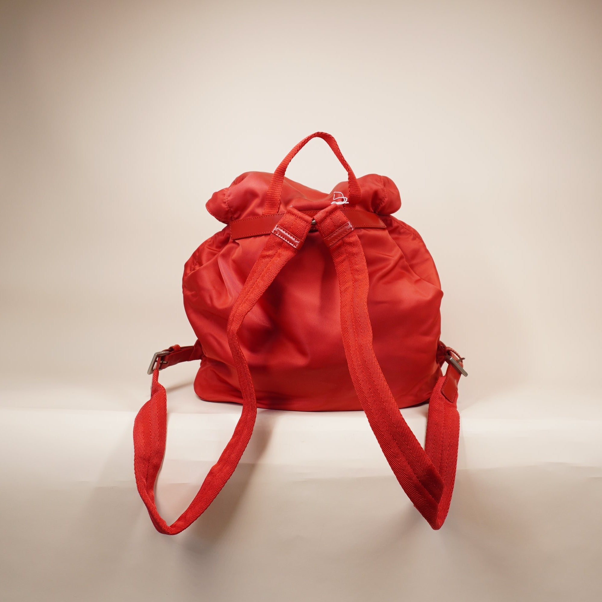 PRE-OWED Red Nylon Small Pocket Drawstring Backpack