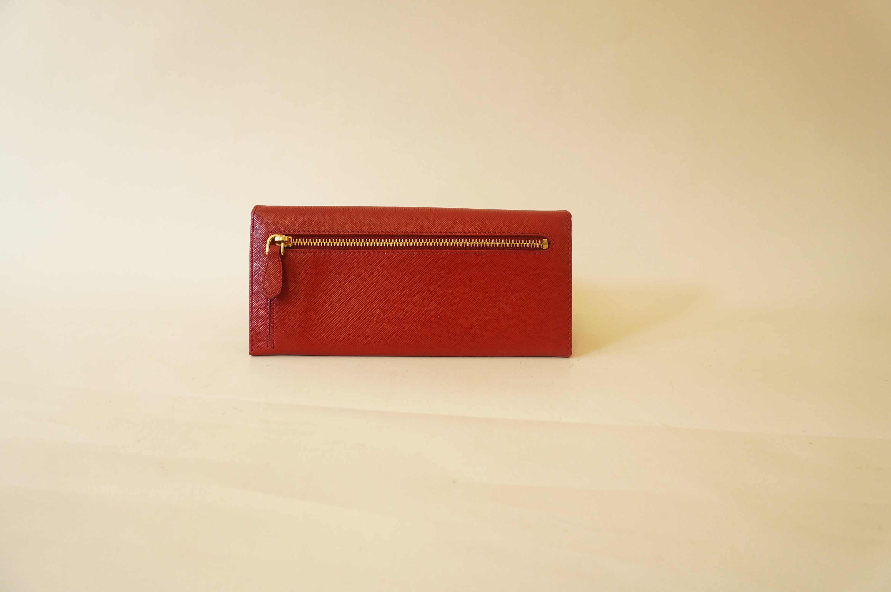 PRE-OWNED Red Saffiano Metal Continental Wallet
