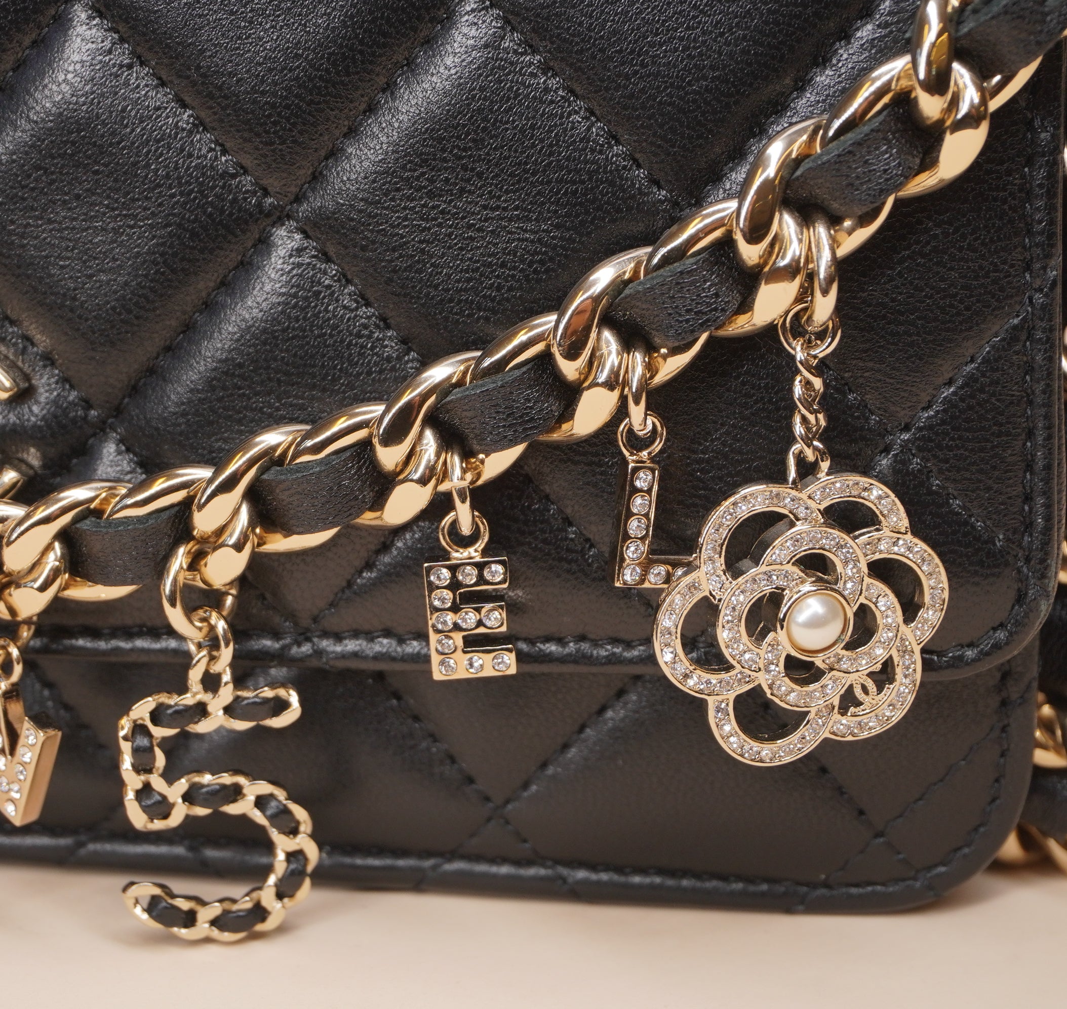 PRE-OWNED CC Black Lambskin Coco Charms Wallet on a Chain Crossbody Bag