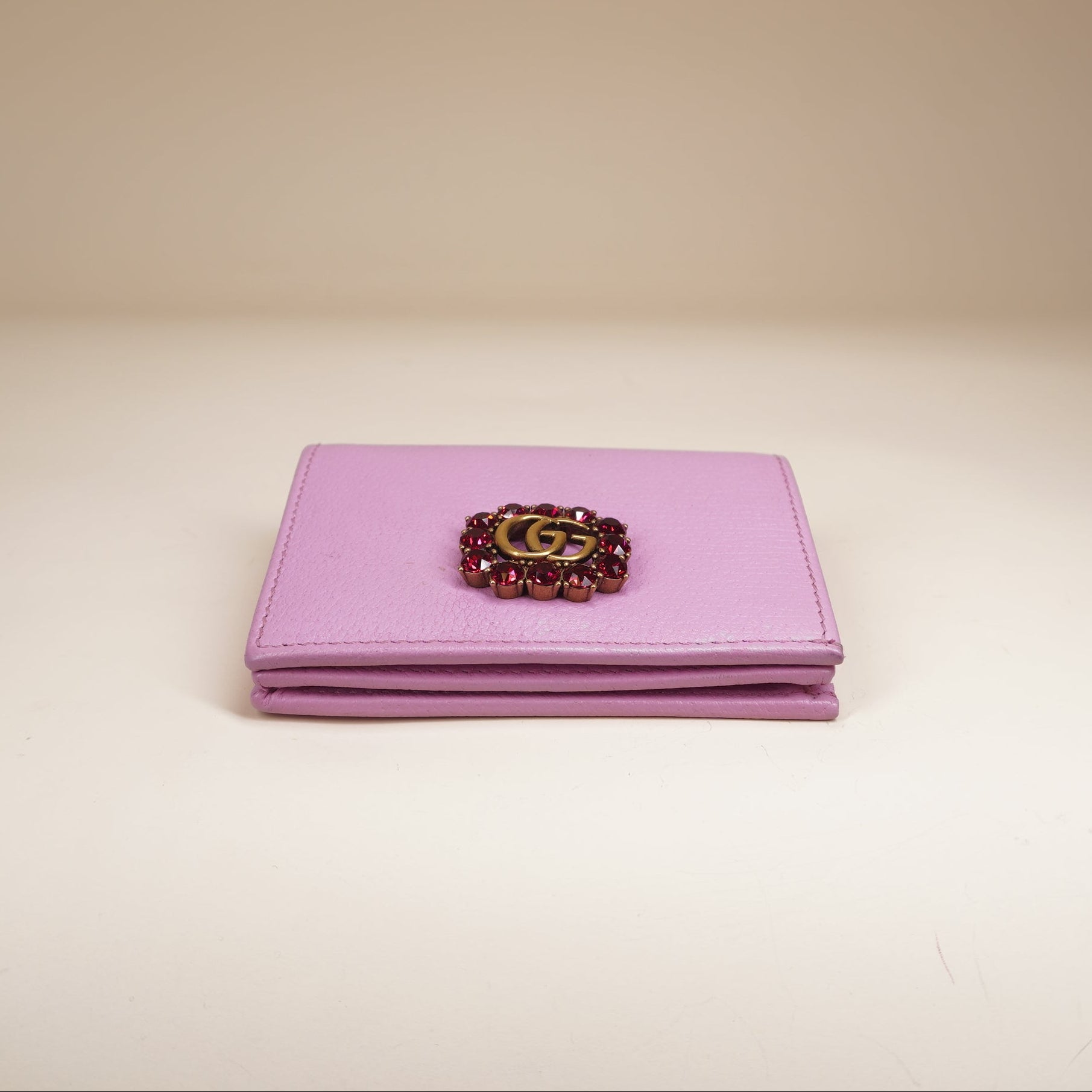 PRE-OWNED GG Marmont bi-fold wallet in pink leather with a crystal-encrusted Double G