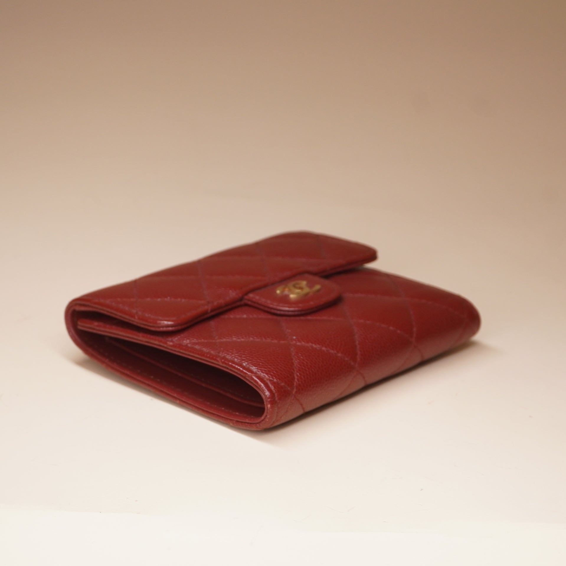 PRE-OWNED CC Red Caviar Quilted Compact Flap Wallet