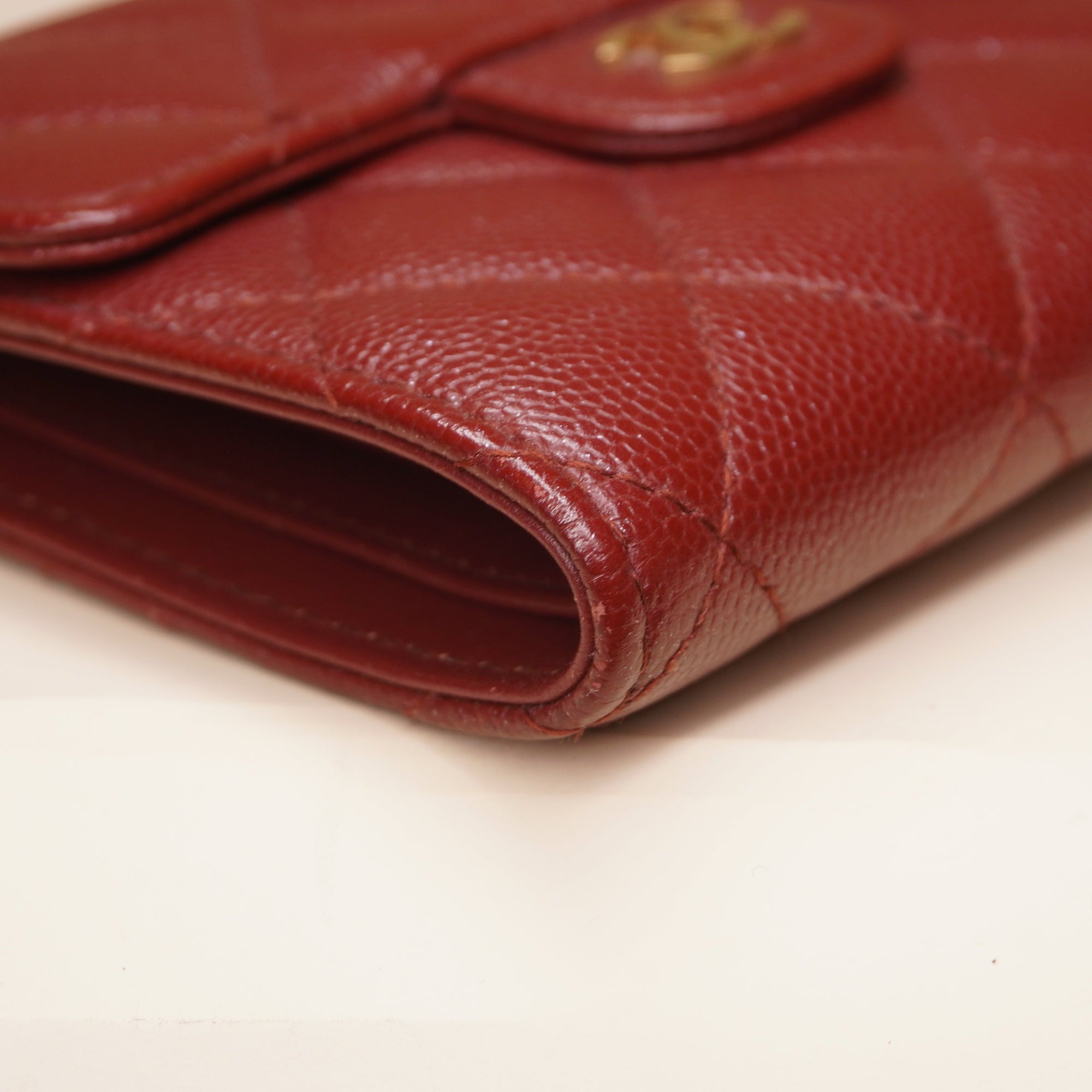 PRE-OWNED CC Red Caviar Quilted Compact Flap Wallet