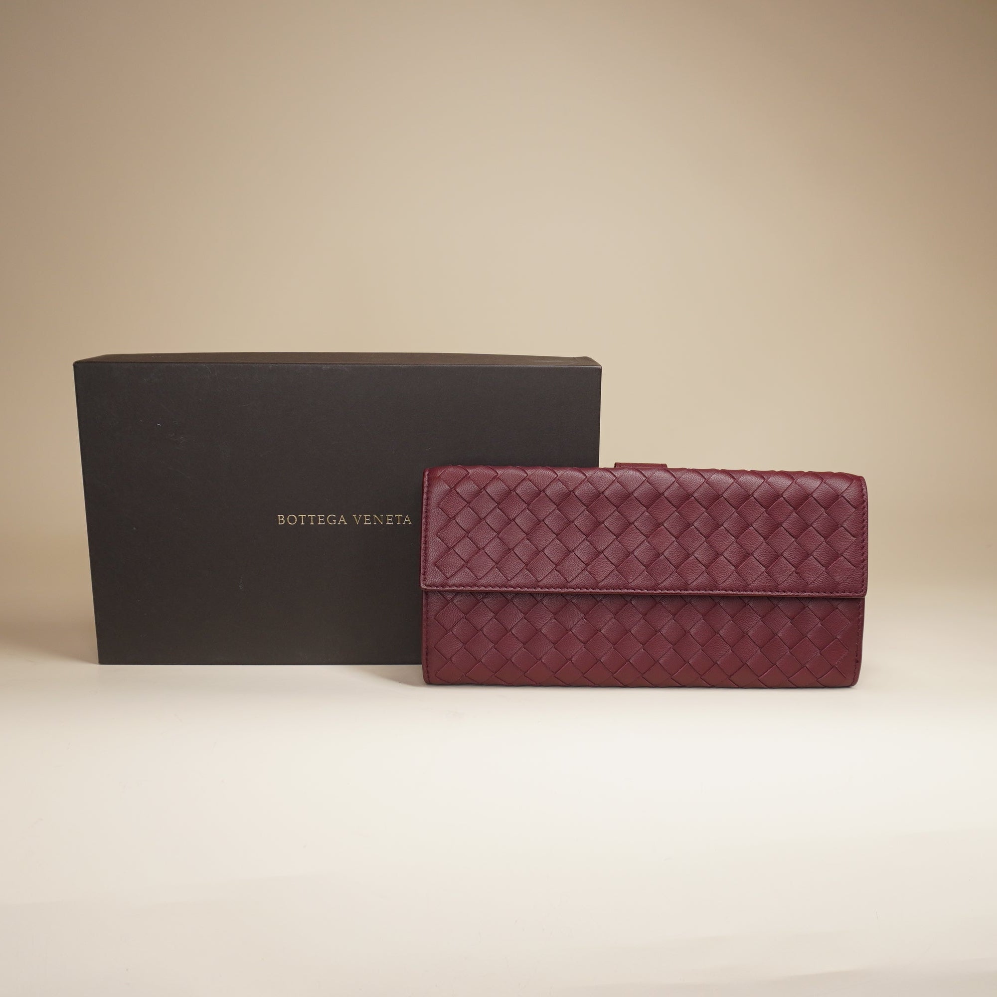 PRE-OWNED  Burgundy Intrecciato Leather Continental Flap Wallet