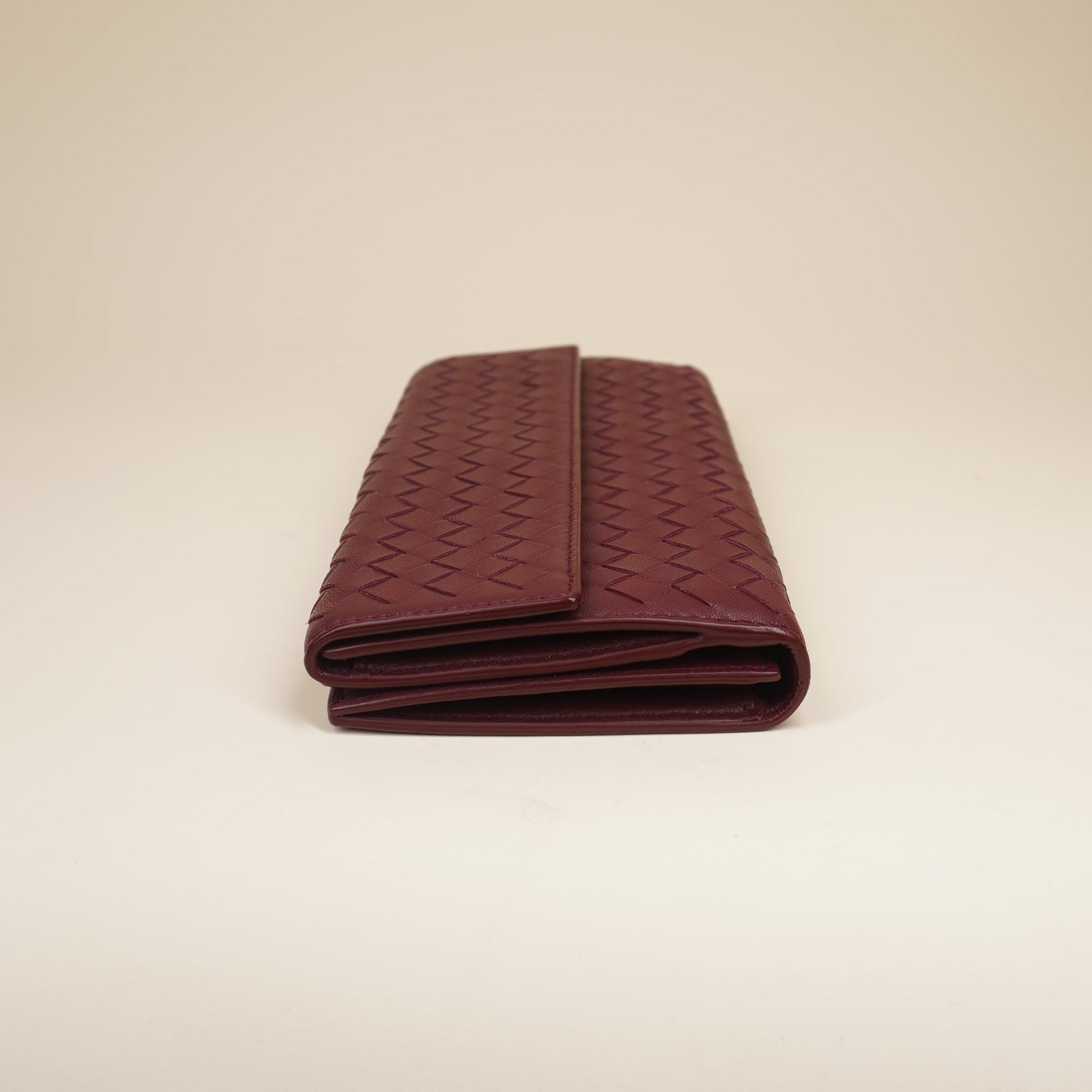 PRE-OWNED  Burgundy Intrecciato Leather Continental Flap Wallet