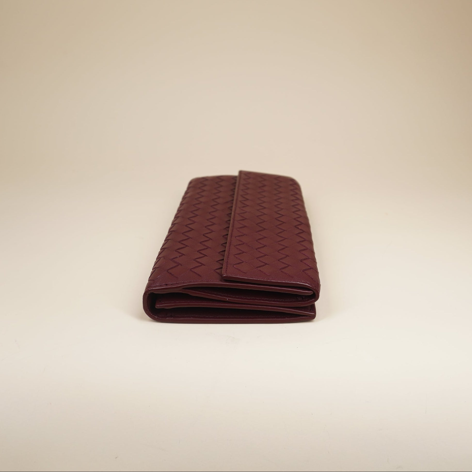 PRE-OWNED  Burgundy Intrecciato Leather Continental Flap Wallet