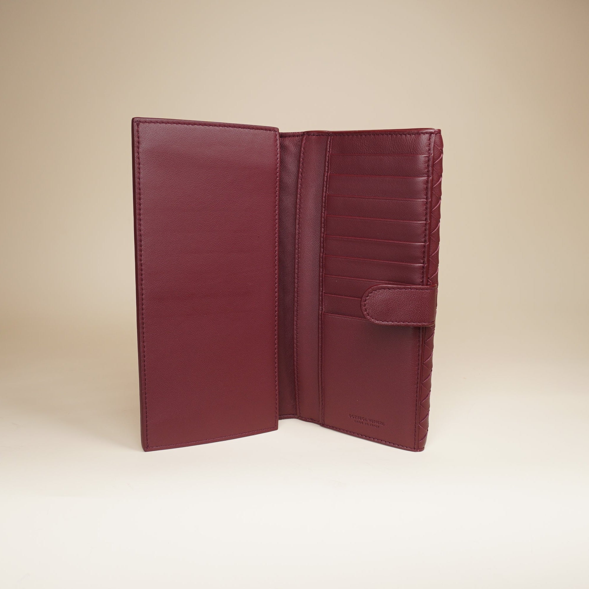 PRE-OWNED  Burgundy Intrecciato Leather Continental Flap Wallet