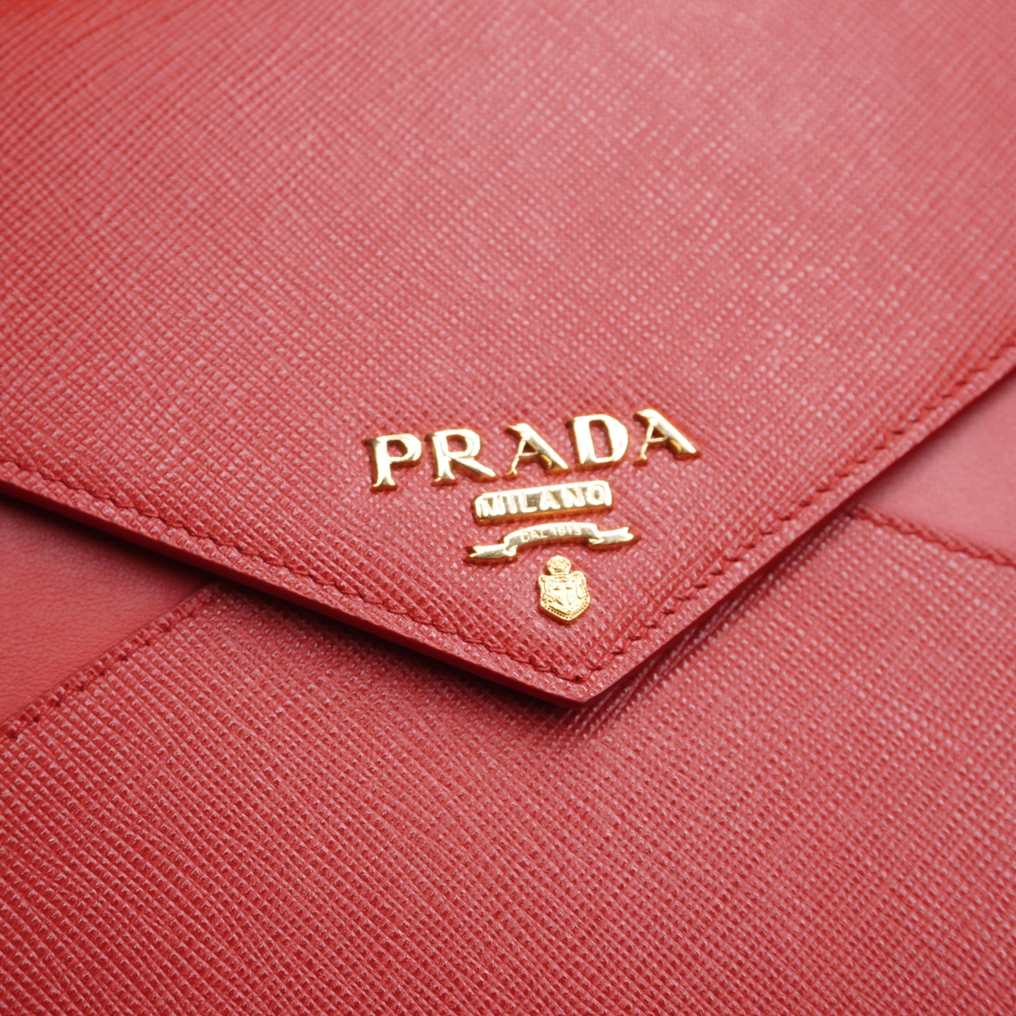 PRE-OWNED Red Saffiano Envelope Clutch