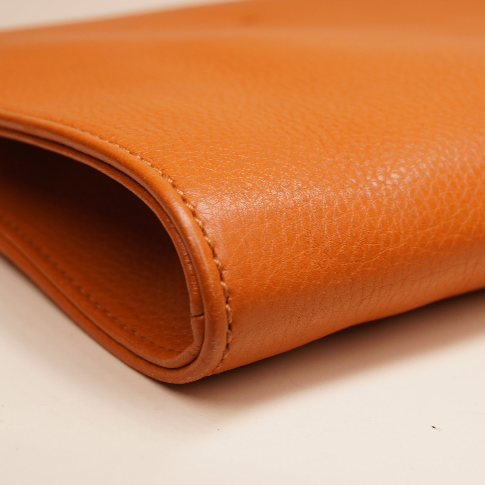 PRE-OWNED GG Orange Leather Bamboo Tassel Clutch
